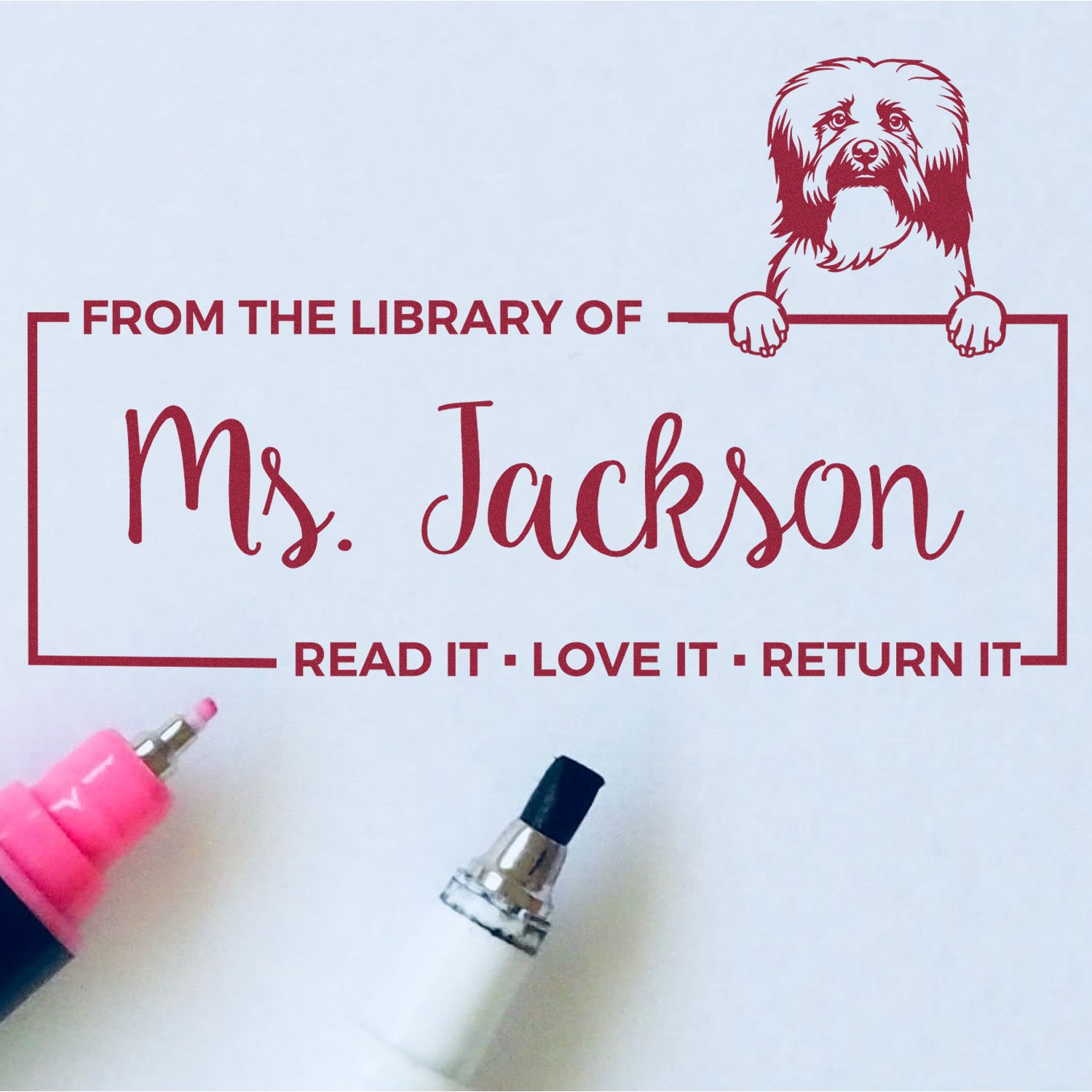 Custom library bookplate rubber stamp for books, "From the Library of Ms. Jackson" with dog design and return reminder.