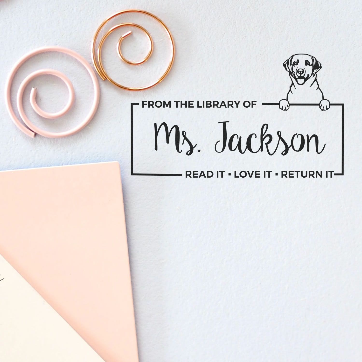 Custom library rubber stamp with dog graphic: From the Library of Ms. Jackson, Read it, Love it, Return it