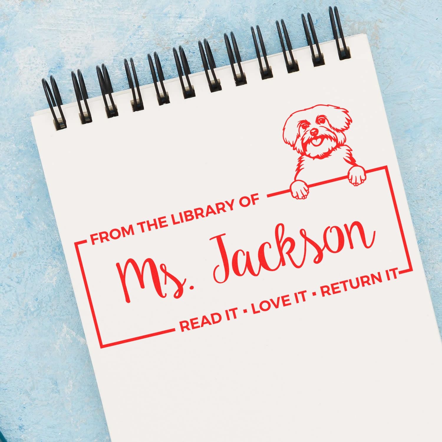 Personalized library book return rubber stamp for Ms. Jackson with dog design and Read it, love it, return it text.