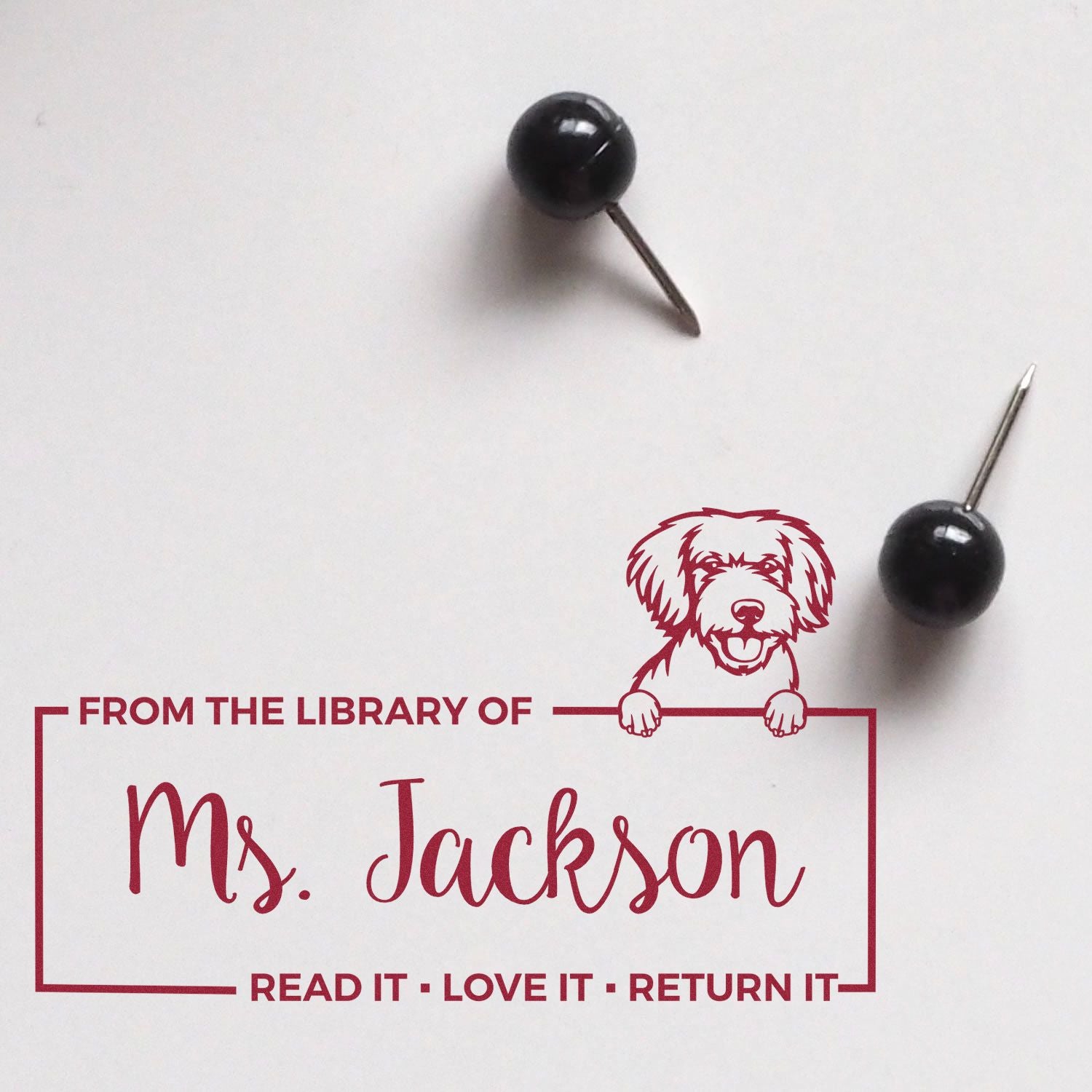 Custom library rubber stamp with dog design, personalized for Ms. Jackson, saying Read It  Love It  Return It.