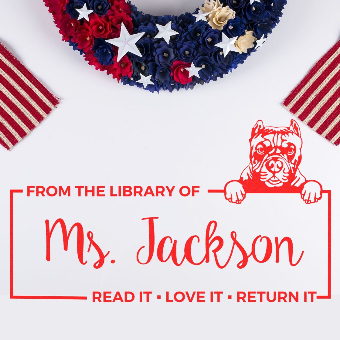 Personalized library rubber stamp for Ms. Jackson with dog design and Read it, love it, return it bookplate text.