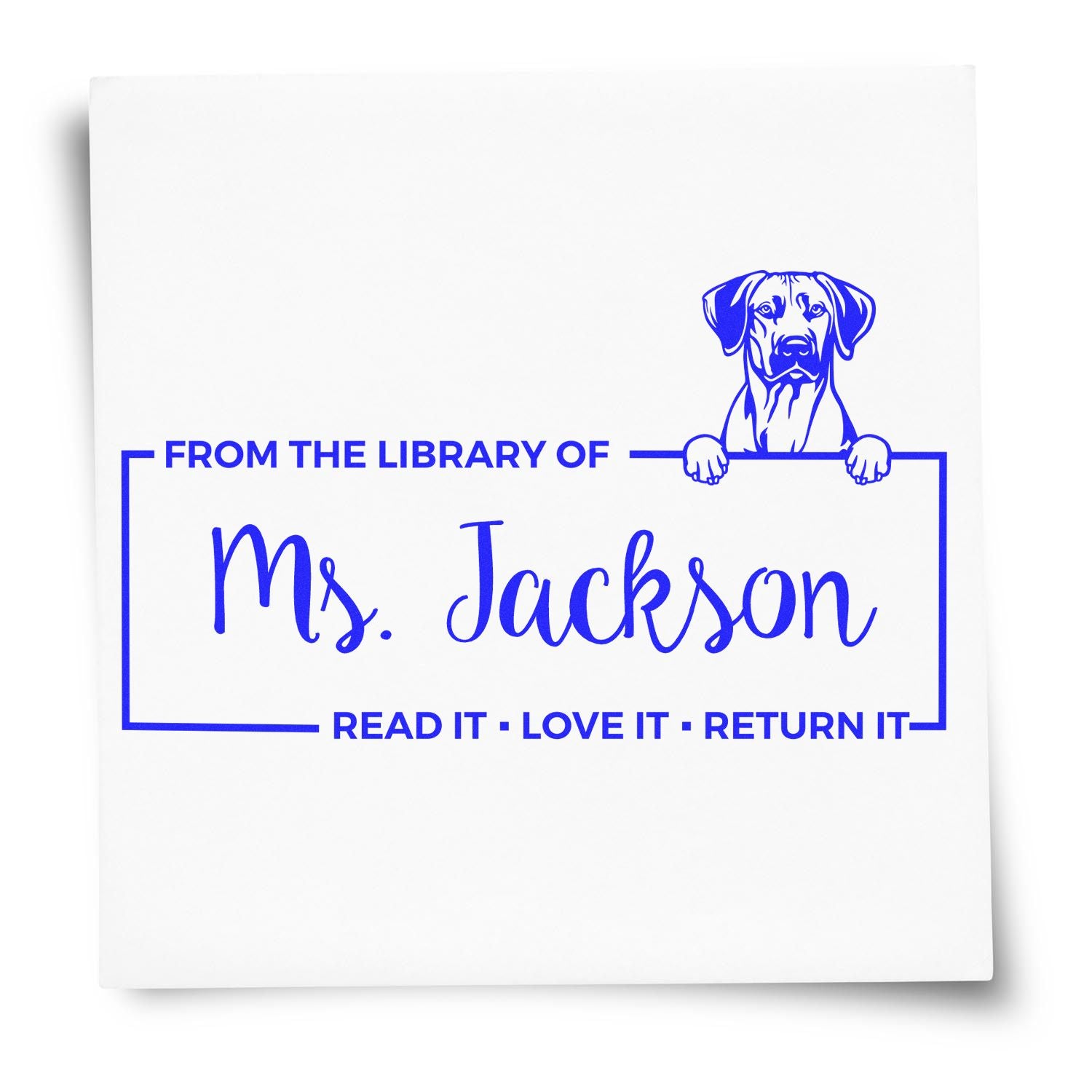 Custom library rubber stamp with dog design reading From the Library of Ms. Jackson and Read it, Love it, Return it.
