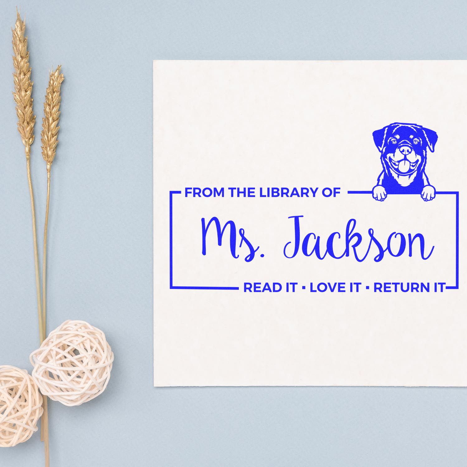 Custom dog library rubber stamp for Mrs. Jackson, marking books with a From the Library Of return-it message.
