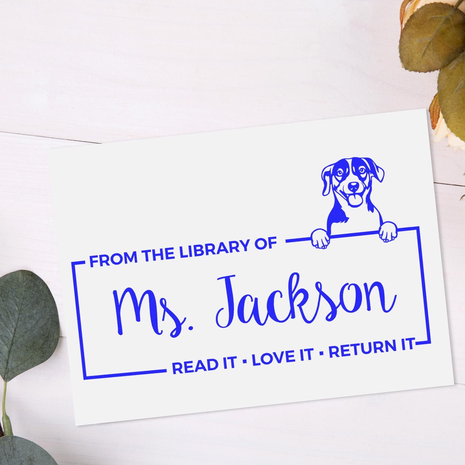 Custom library return rubber stamp for Ms. Jackson with dog design, perfect for personalizing books and lending collections.