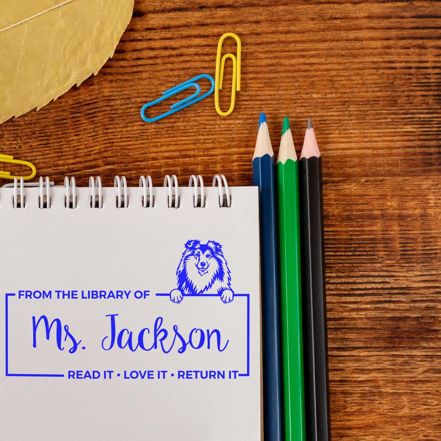 Custom library book stamp for Ms. Jackson with dog icon and return-it message, perfect for personalized rubber stamps.