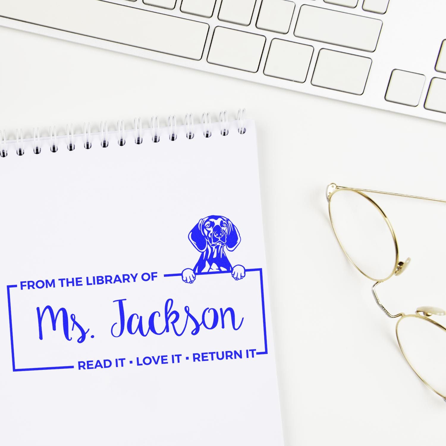 Personalized rubber library stamp for Ms. Jackson with dog design, ideal for marking classroom books and returns.