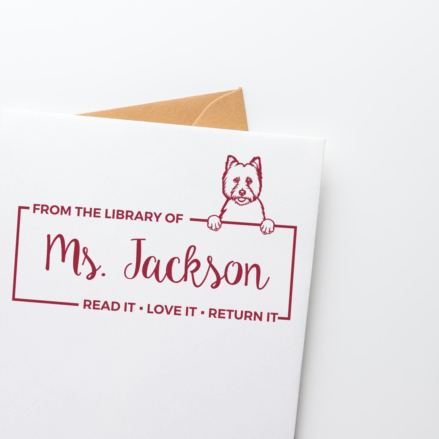 Custom library bookplate rubber stamp with dog design for Ms. Jackson, featuring Read it, Love it, Return it text.