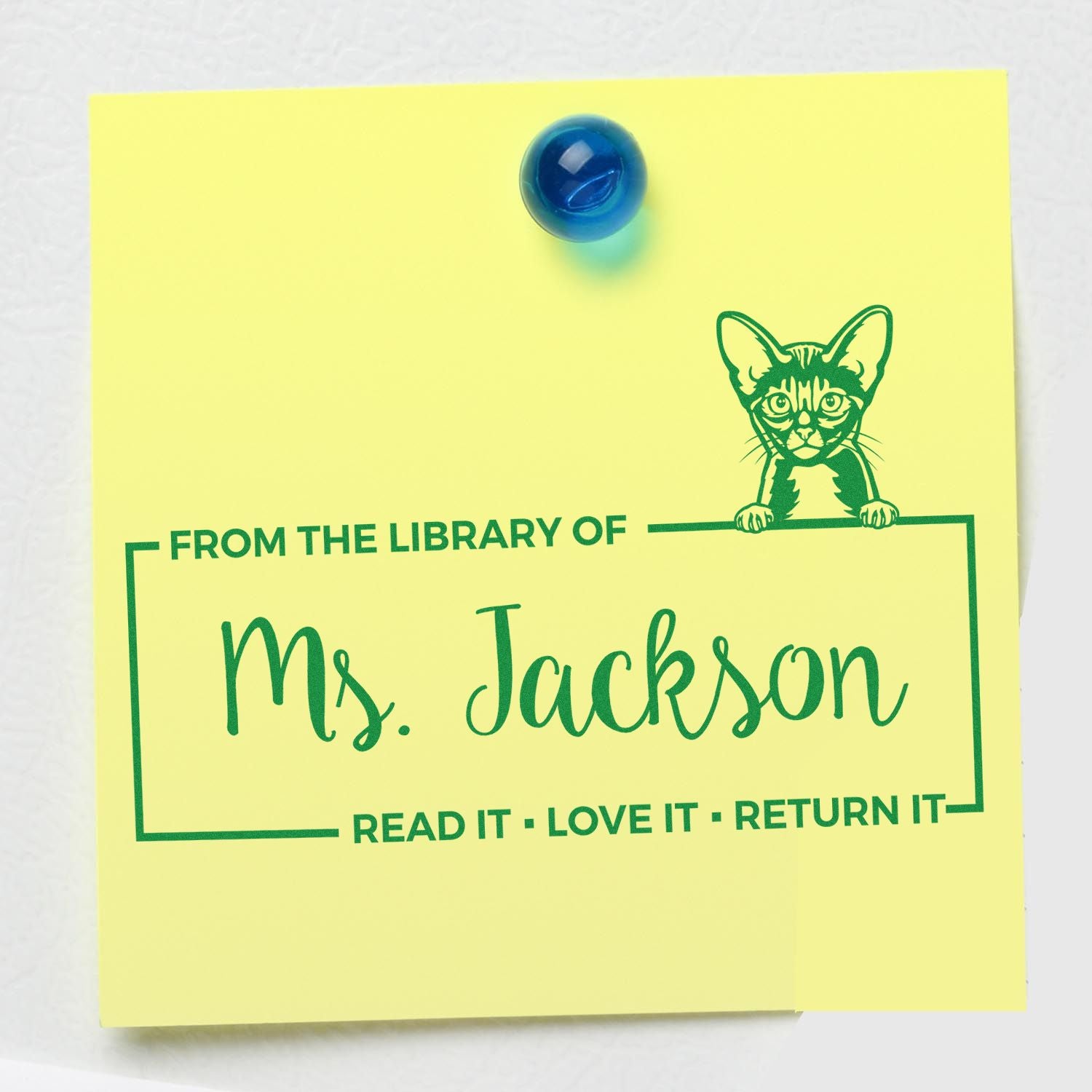 Personalized cat-themed library book stamp for Ms. Jackson with From the Library of and Read it, Love it, Return it text.