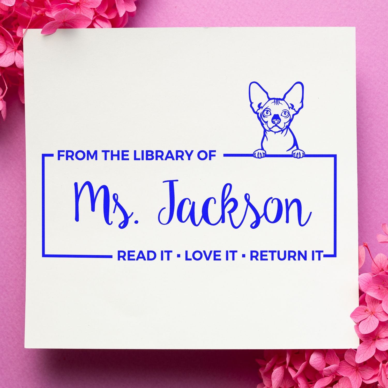 Custom dog library rubber stamp for Ms. Jackson with From the Library Of and Read It, Love It, Return It text.