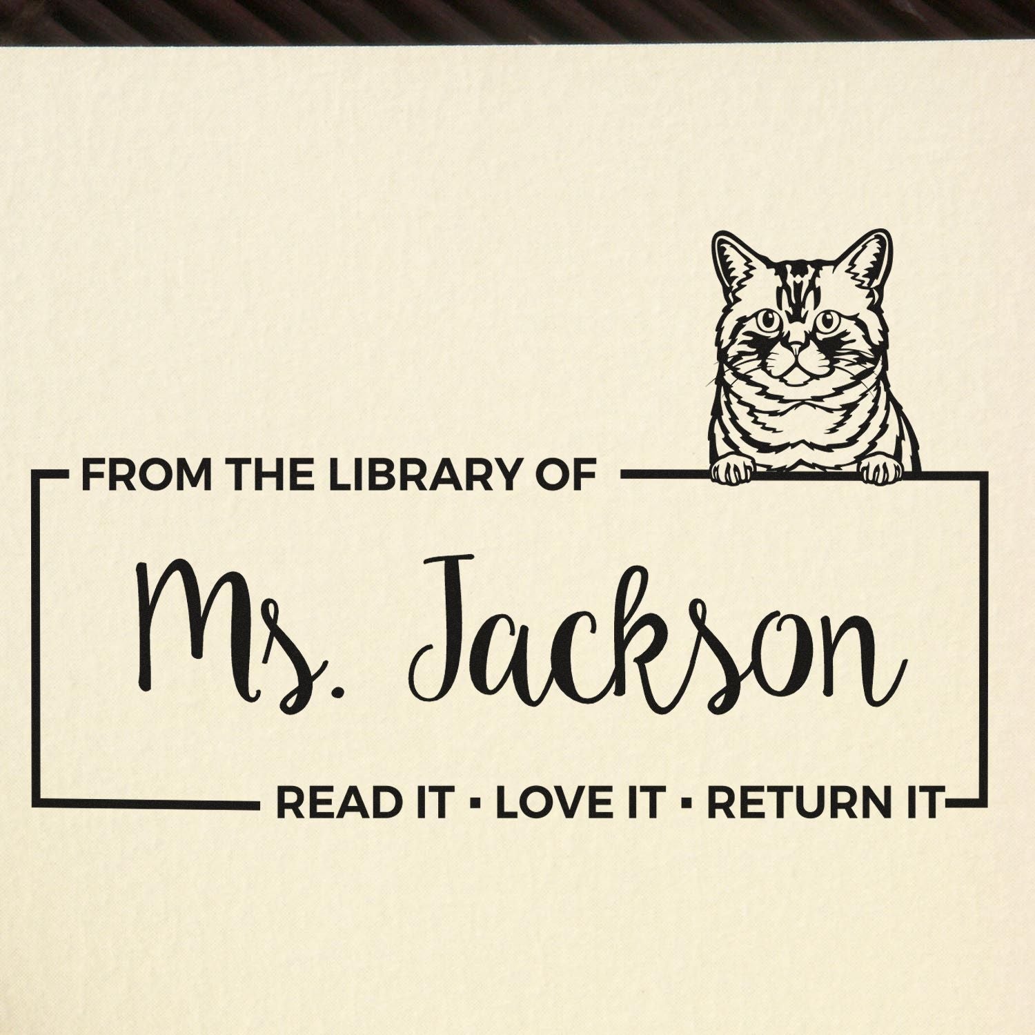 Personalized cat library rubber stamp reading From the Library of Ms. Jackson with Read It, Love It, Return It.