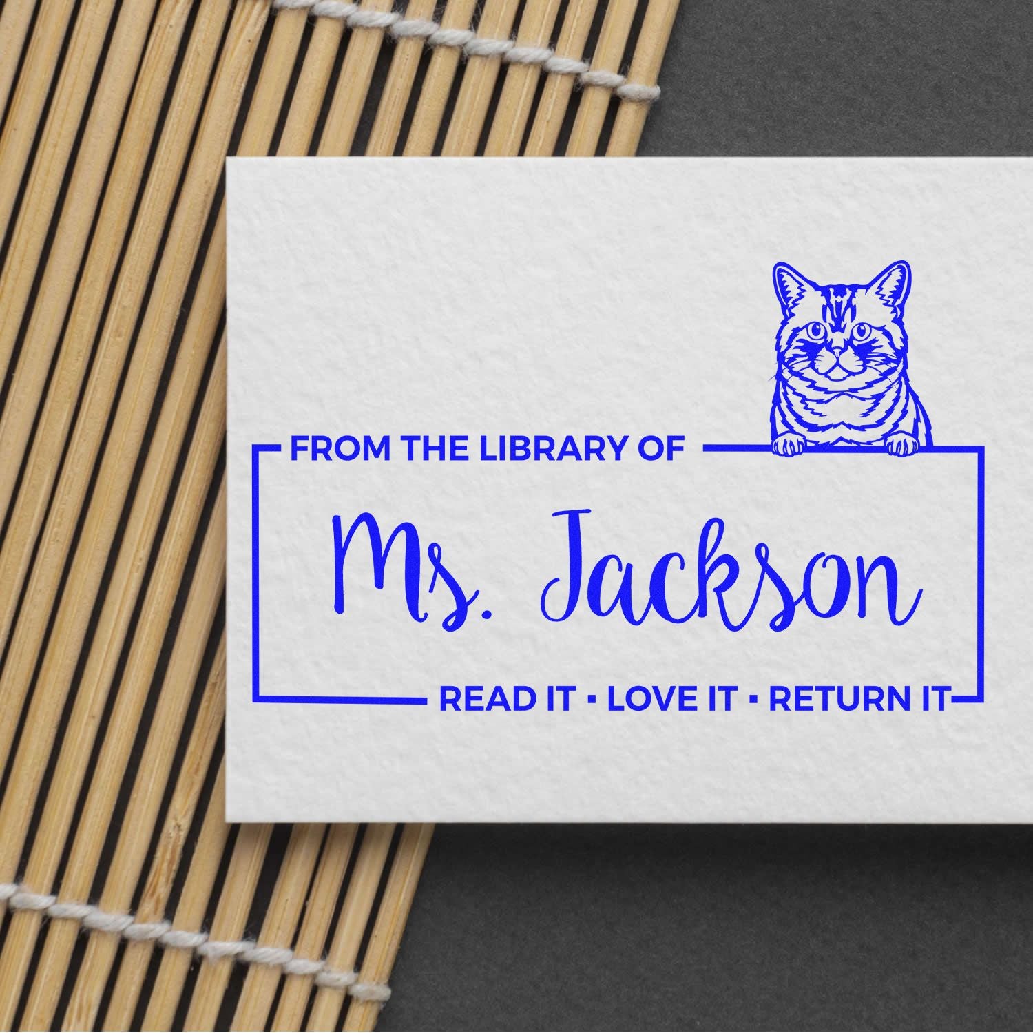 Custom cat library rubber stamp for books, featuring From the Library of Ms. Jackson and Read It, Love It, Return It bookplate design.