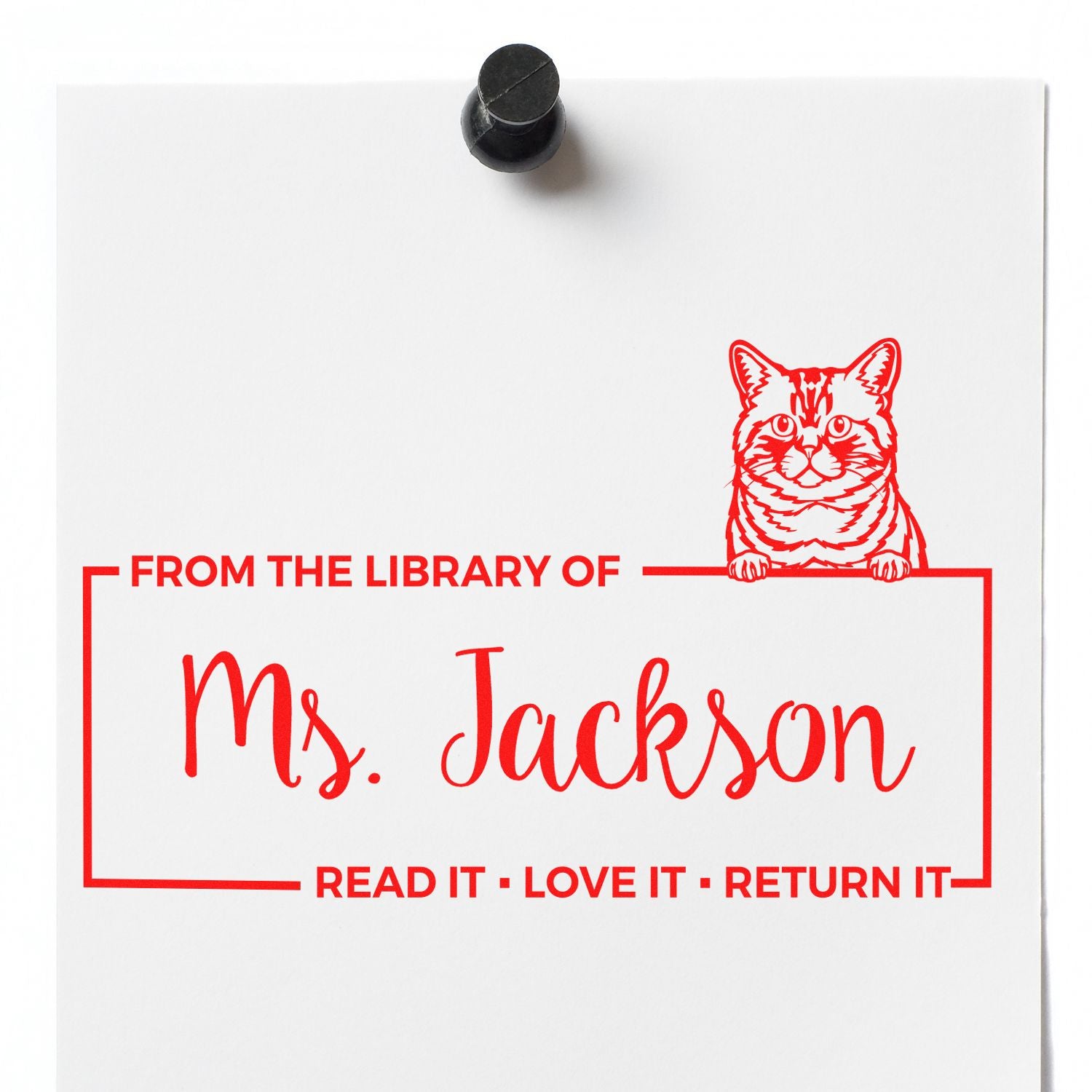 Custom library rubber stamp with cat design and personalized From the Library of Ms. Jackson return-it message.