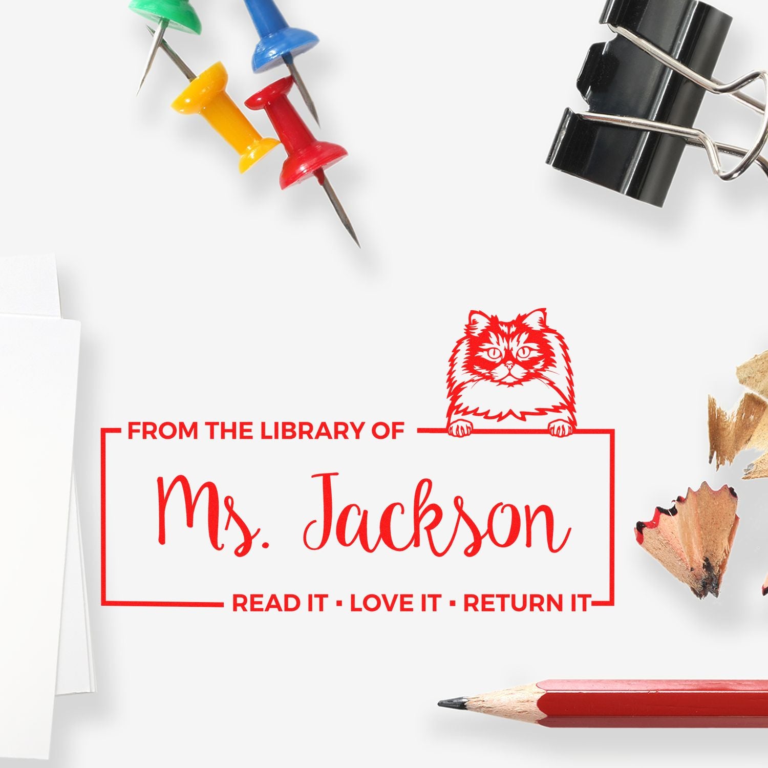 Custom rubber stamp for books: From the Library of Ms. Jackson with cat and Read it, love it, return it reminder.