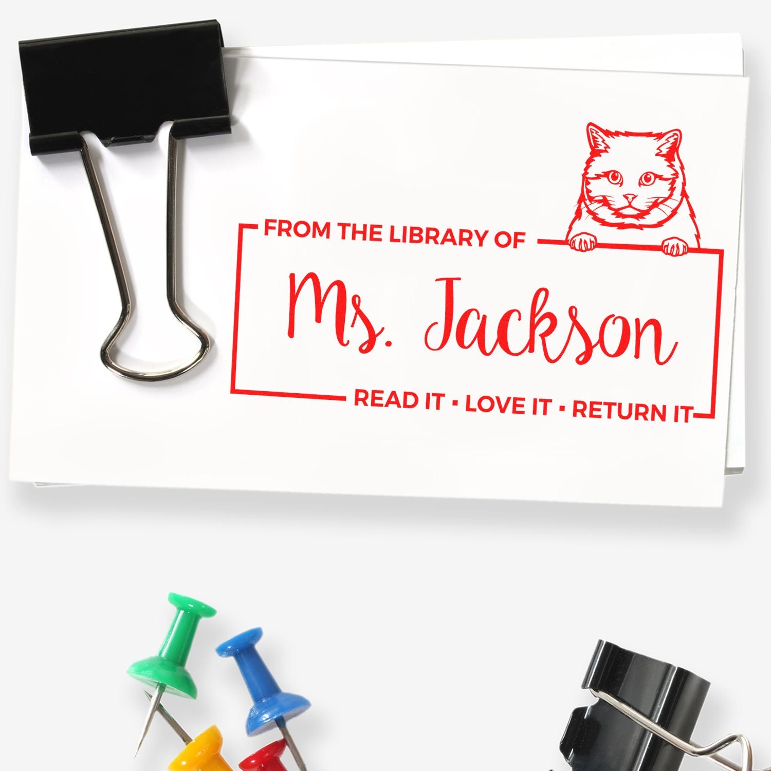 Custom library rubber stamp with cat design, personalized for Ms. Jackson to mark books: Read it, love it, return it.