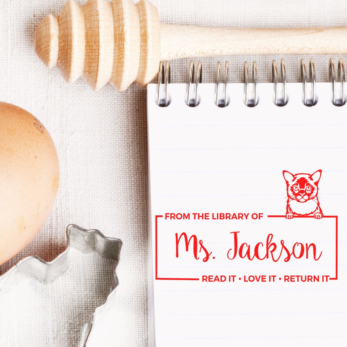 Custom library rubber stamp for teachers, featuring From the Library of Ms. Jackson book return stamp with cat.