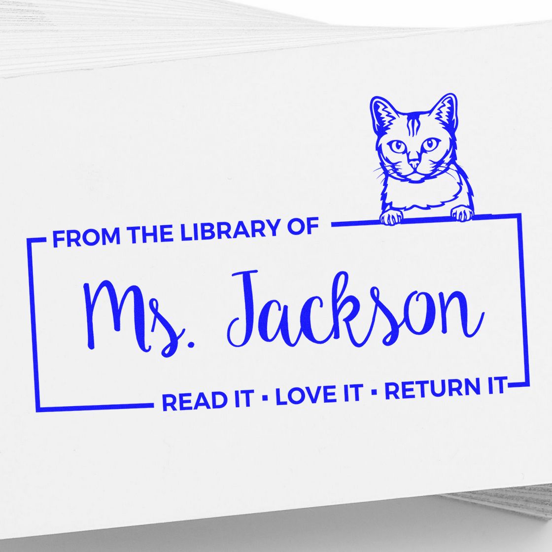 Personalized library rubber stamp with cat design for Ms. Jackson, labeled Read it, Love it, Return it.