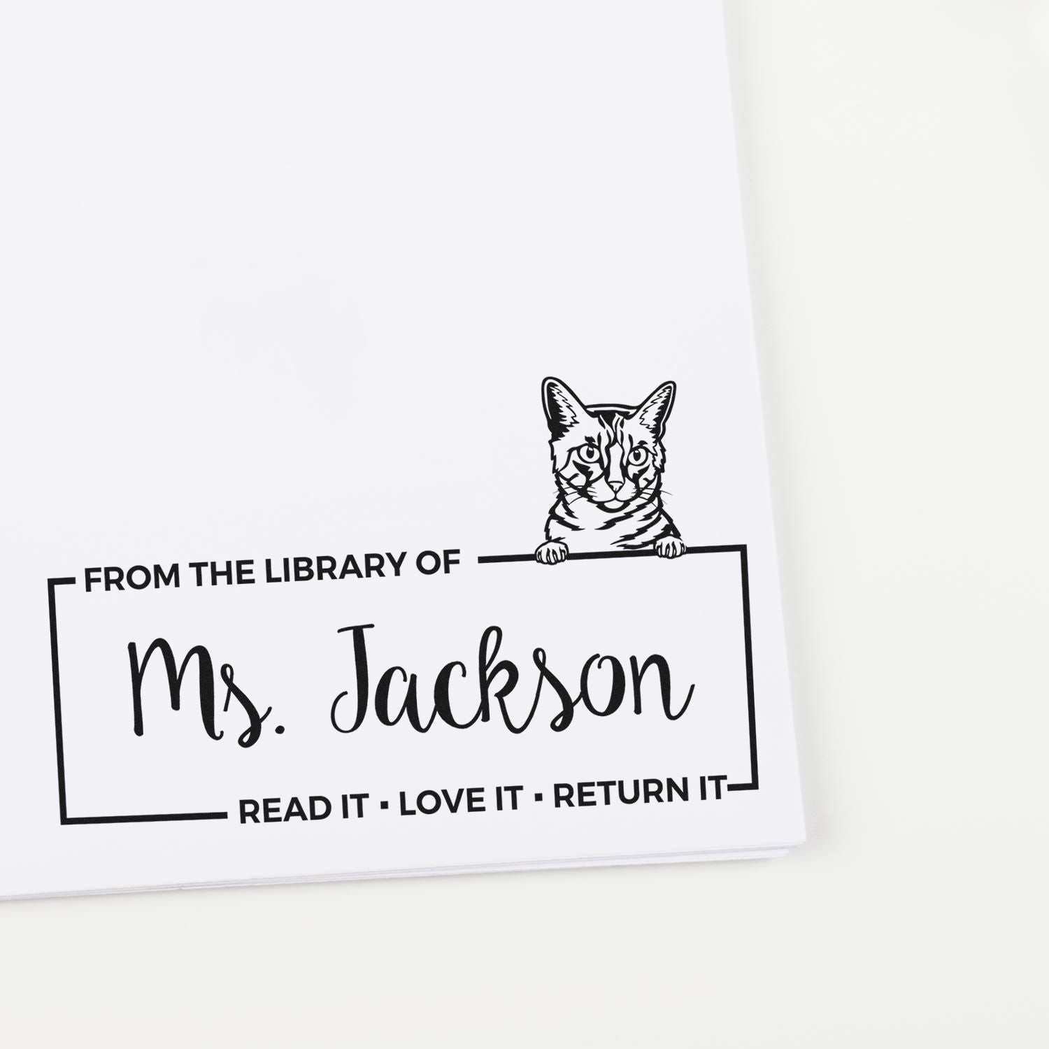 Custom cat library rubber stamp with From the Library of Ms. Jackson, Read It Love It Return It for personal books.