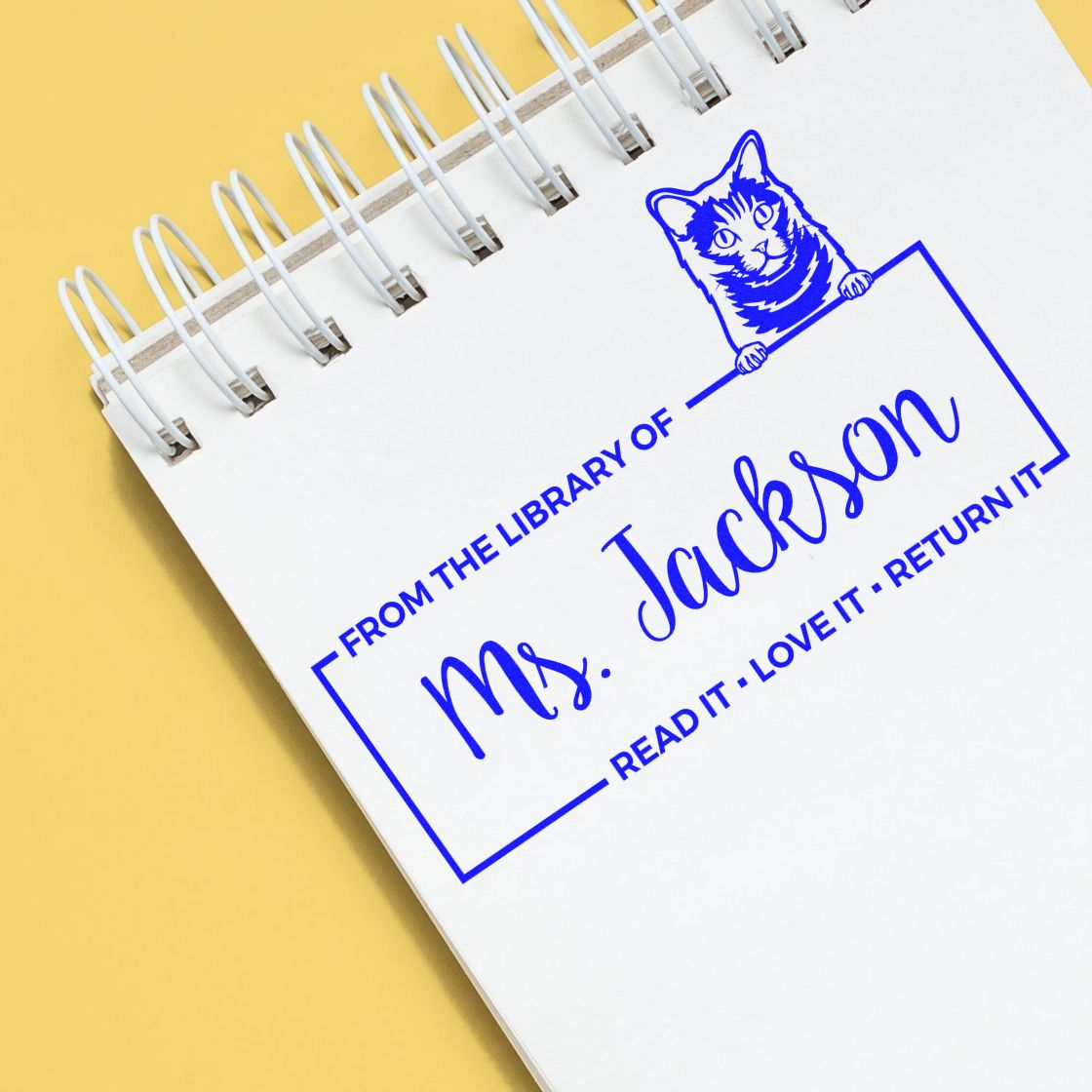 Personalized library rubber stamp with cat bookplate design reading Ms. Jackson and Read it, love it, return it.