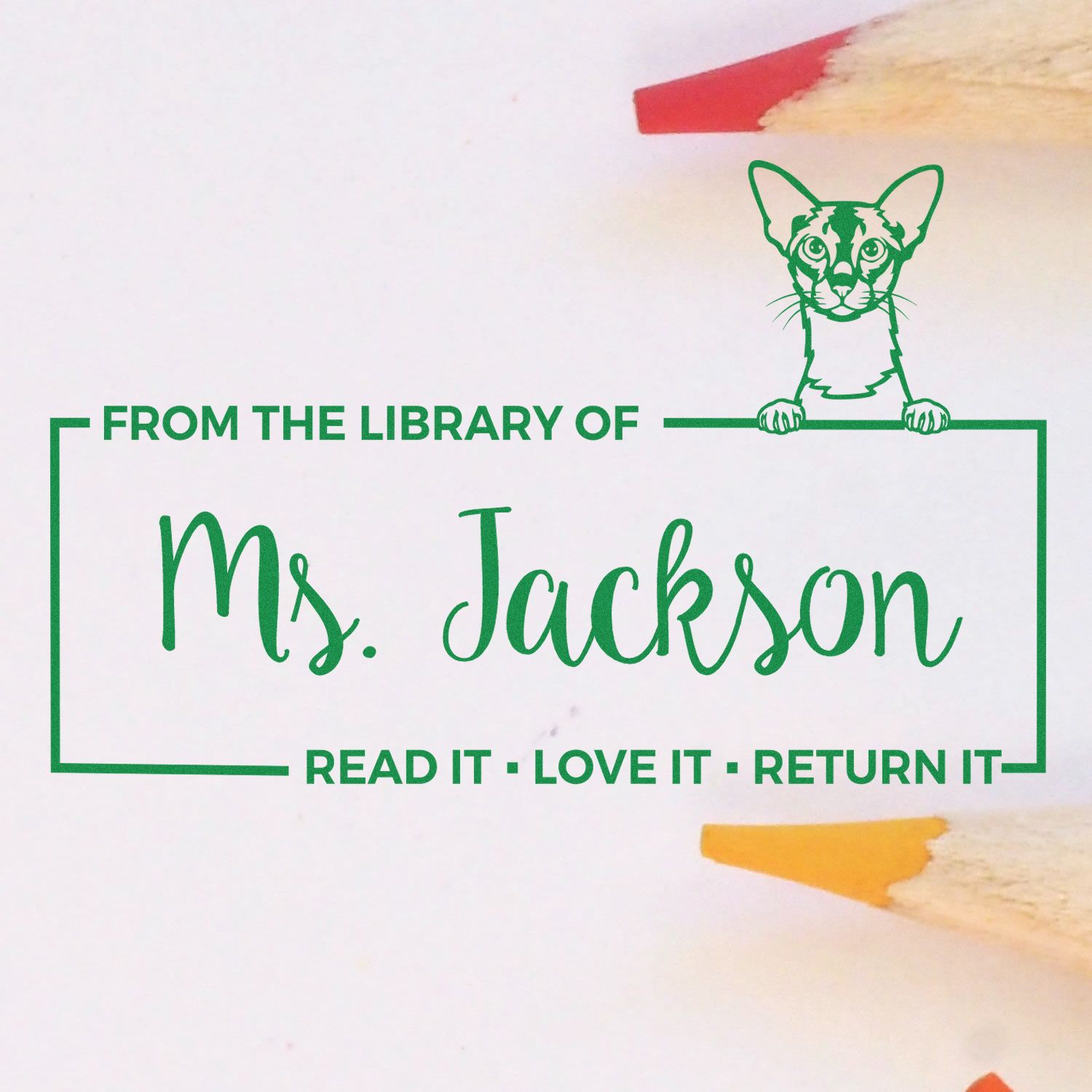 Custom library bookplate rubber stamp for Ms. Jackson with cat graphic and Read it, Love it, Return it text.