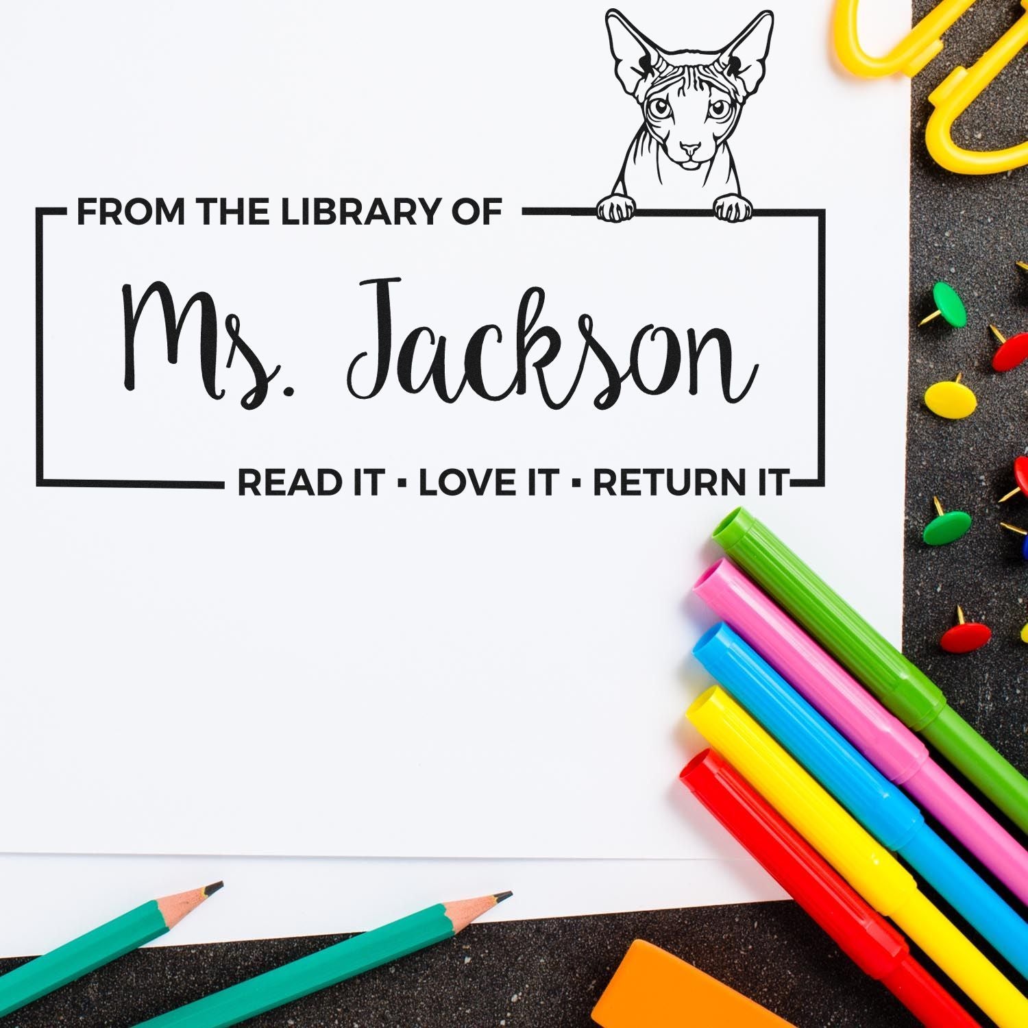 Personalized rubber library stamp for Ms. Jackson with cat design and Read it, love it, return it book return message.