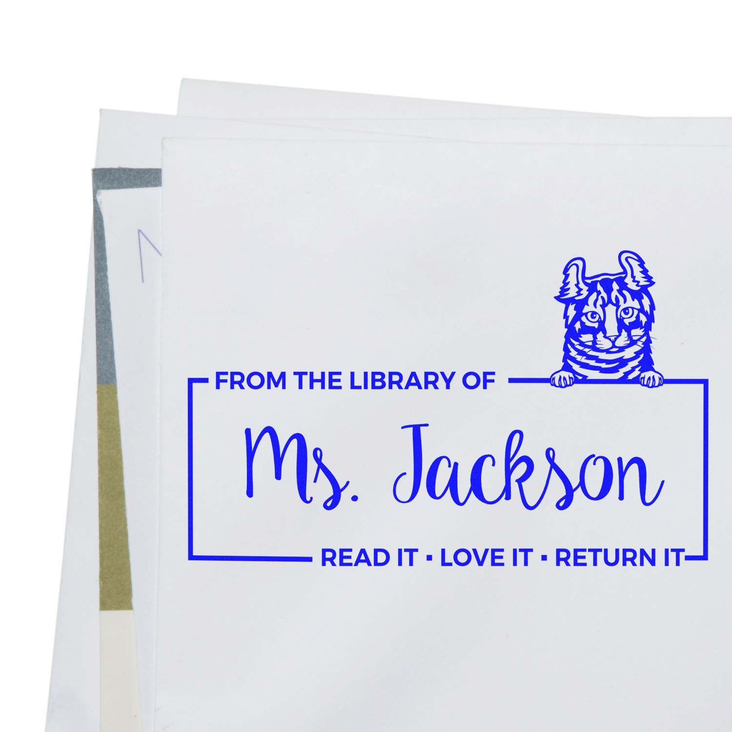 Personalized library book stamp for Ms. Jackson with cat design and Read it, love it, return it message.