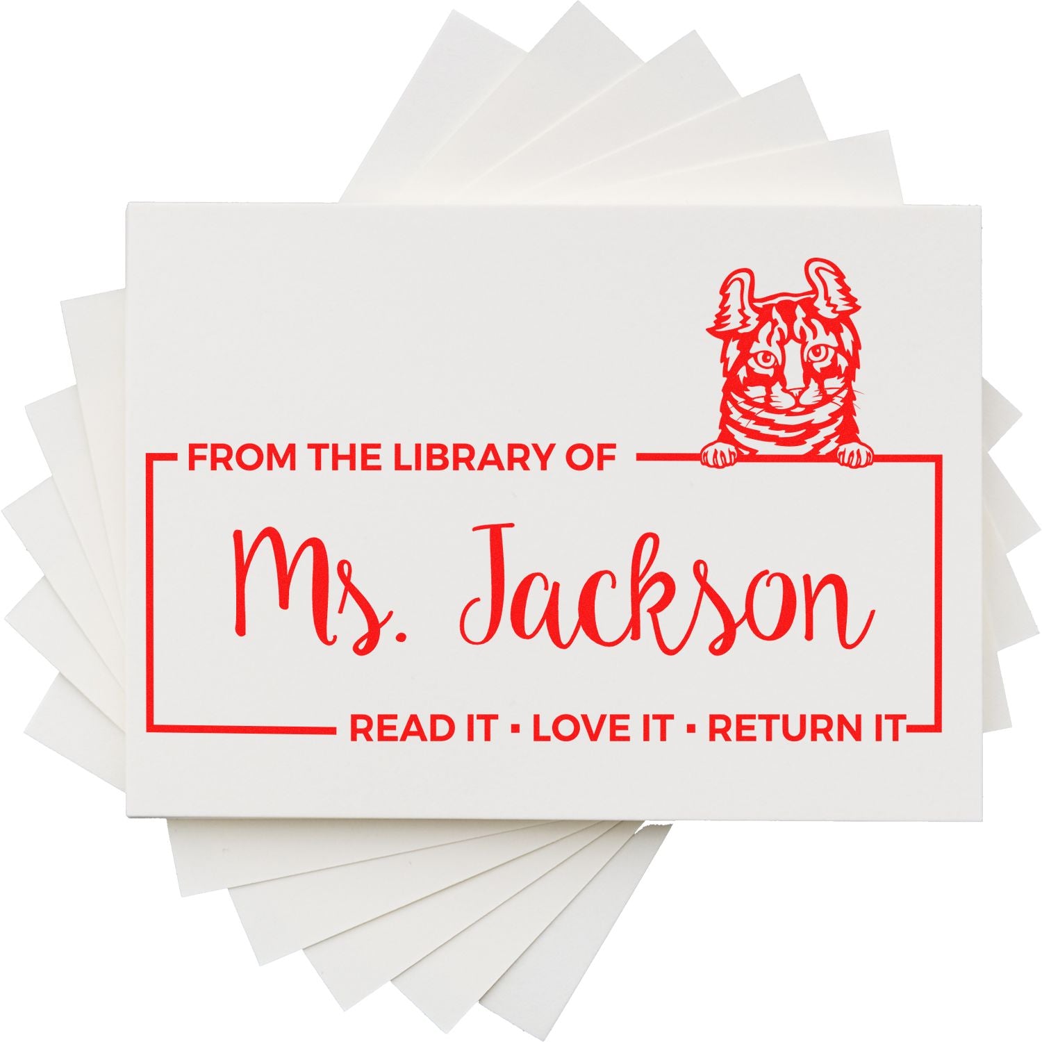 Personalized library book return rubber stamp for Ms. Jackson with cat design and Read it, love it, return it message.