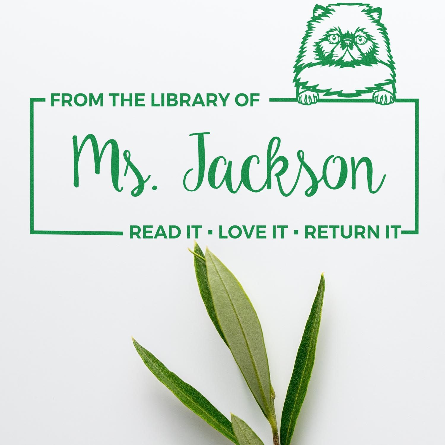 Custom library rubber stamp for Ms. Jackson with cat design and Read it, love it, return it message.
