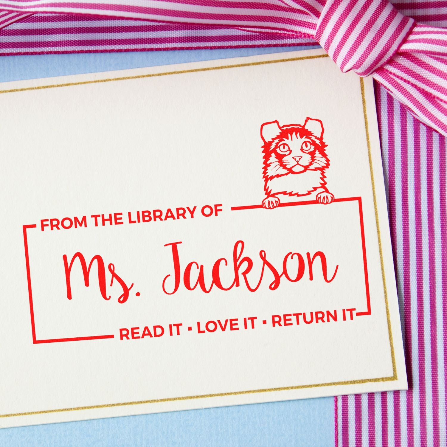 Custom library rubber stamp with cat design for Ms. Jackson bookplates and read-it, love-it, return-it reminders.