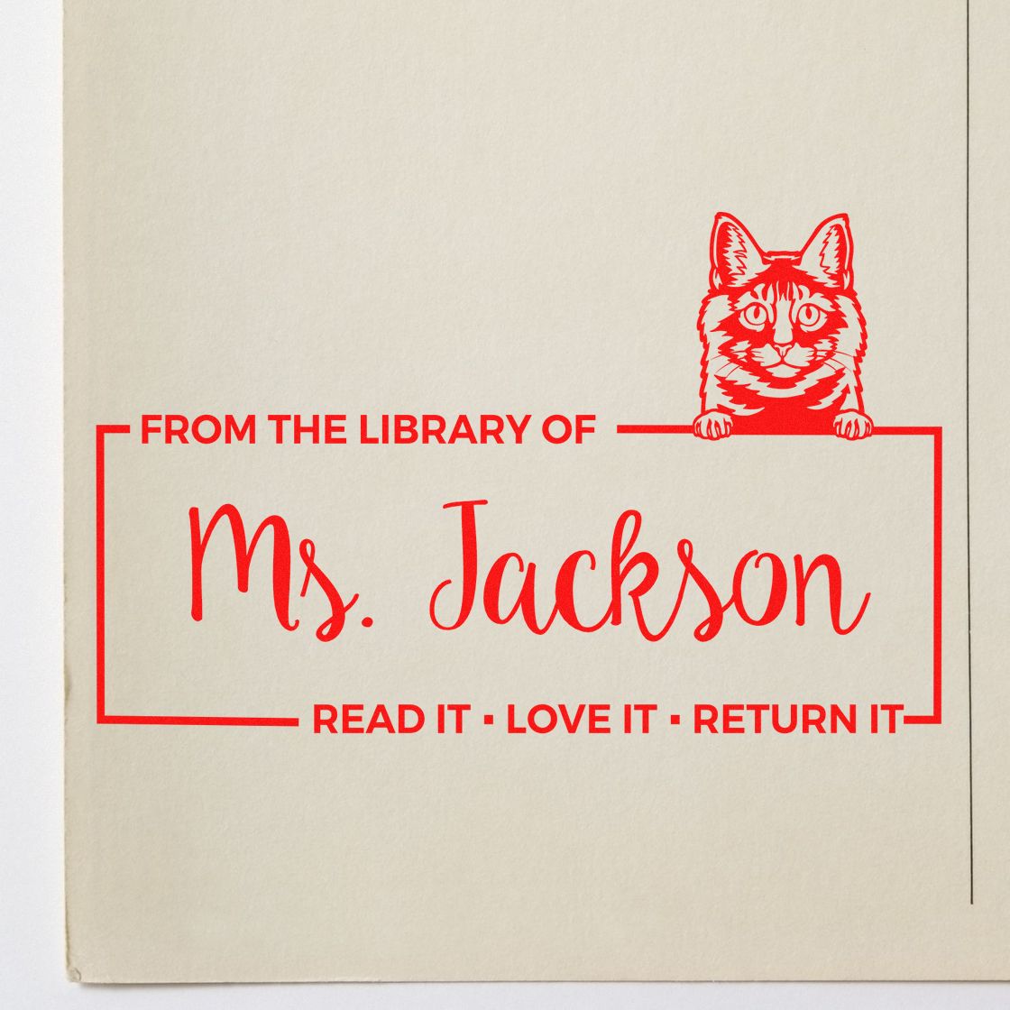 Custom red rubber stamp for library books with cat design: From the library of Ms. Jackson and Read it  Love it  Return it