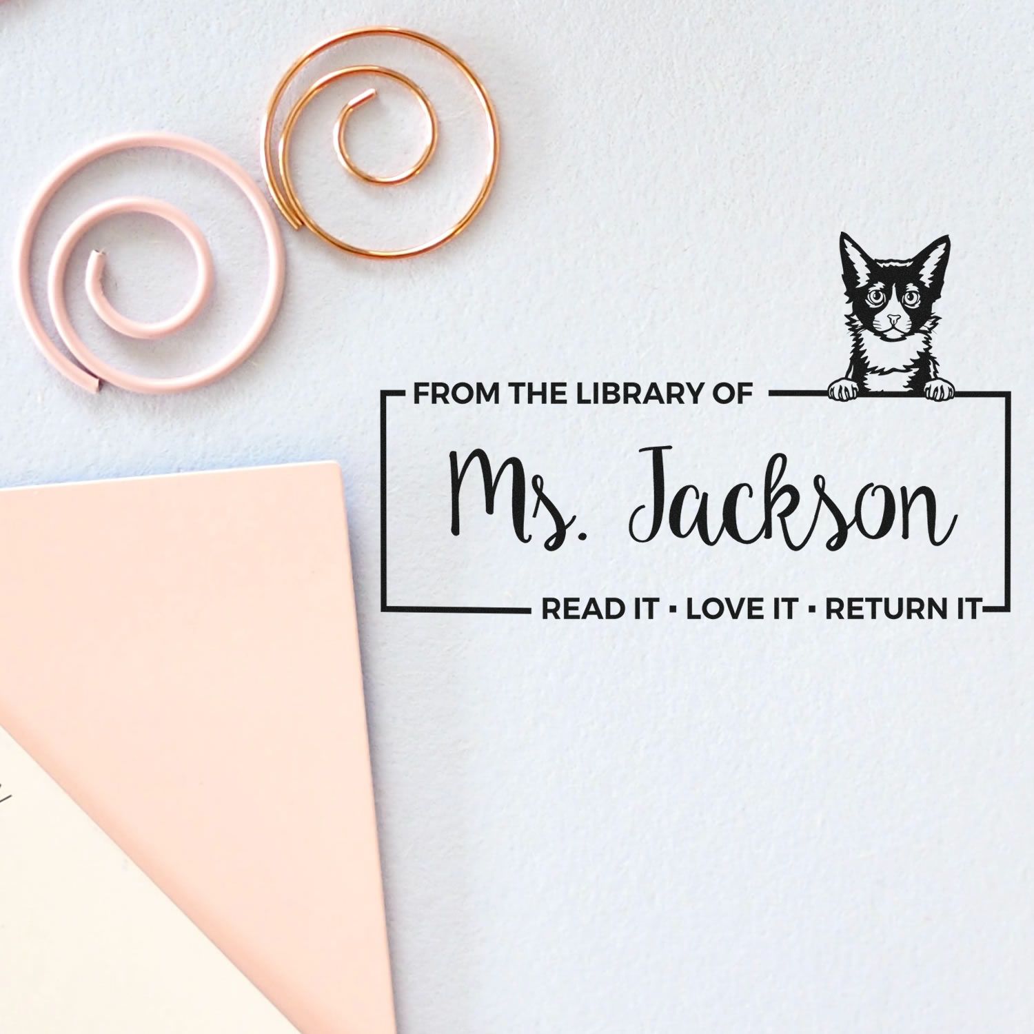 Personalized cat library rubber stamp for Ms. Jackson bookplates, featuring From the Library of and Read It, Love It, Return It.