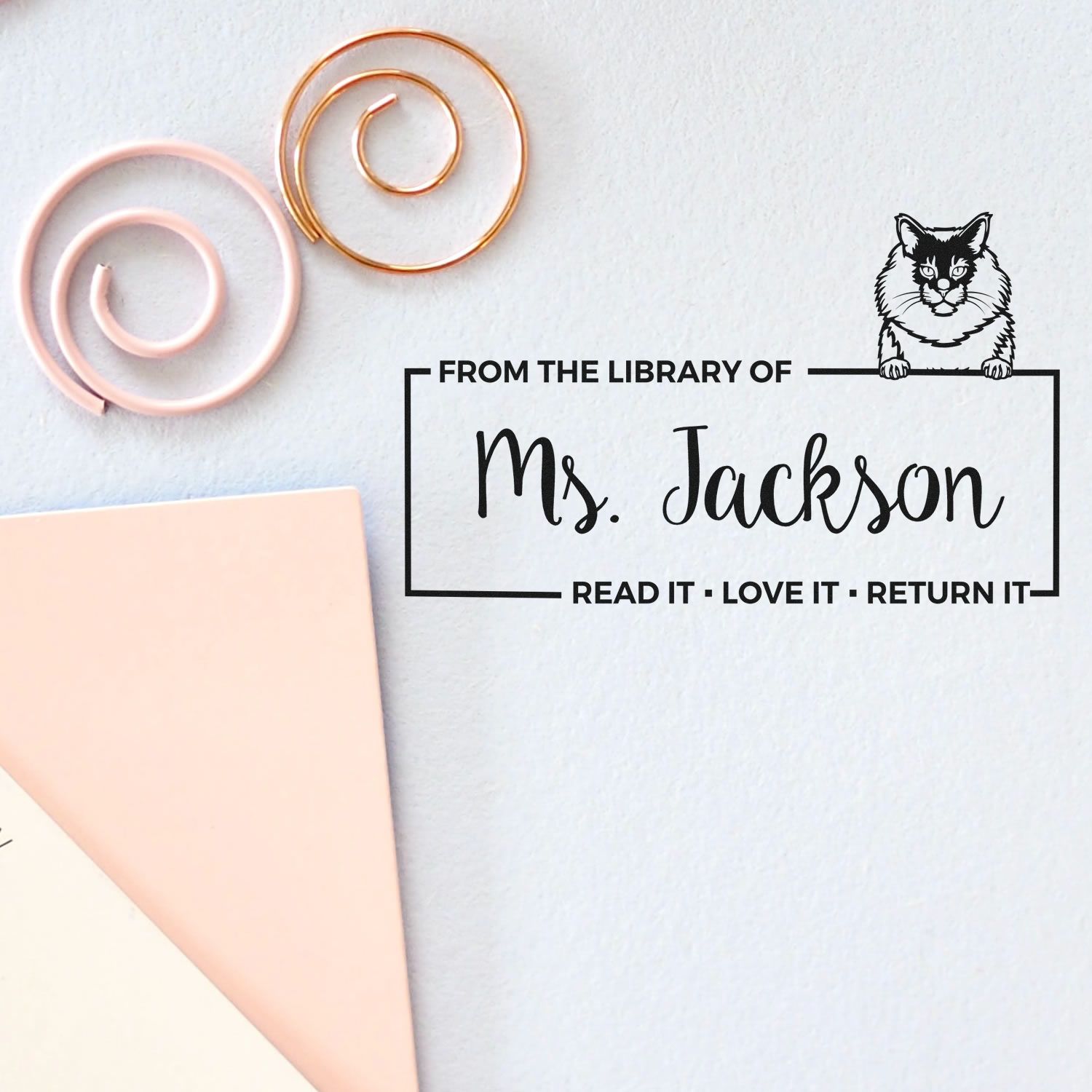 Personalized library book stamp with cat design, reading From the Library of Ms. Jackson and Read it, Love it, Return it.