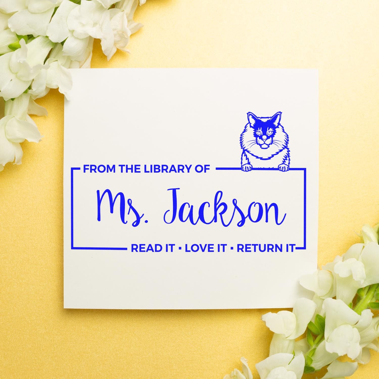 Custom classroom library rubber stamp for Ms. Jackson with cat design and Read it, love it, return it message.