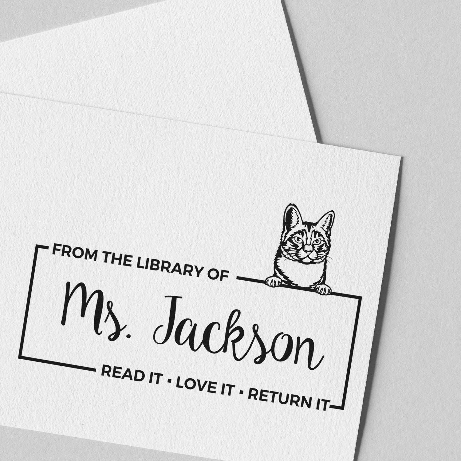 Personalized library rubber stamp with cat design, reading From the Library of Mrs. Jackson, Read it - Love it - Return it.