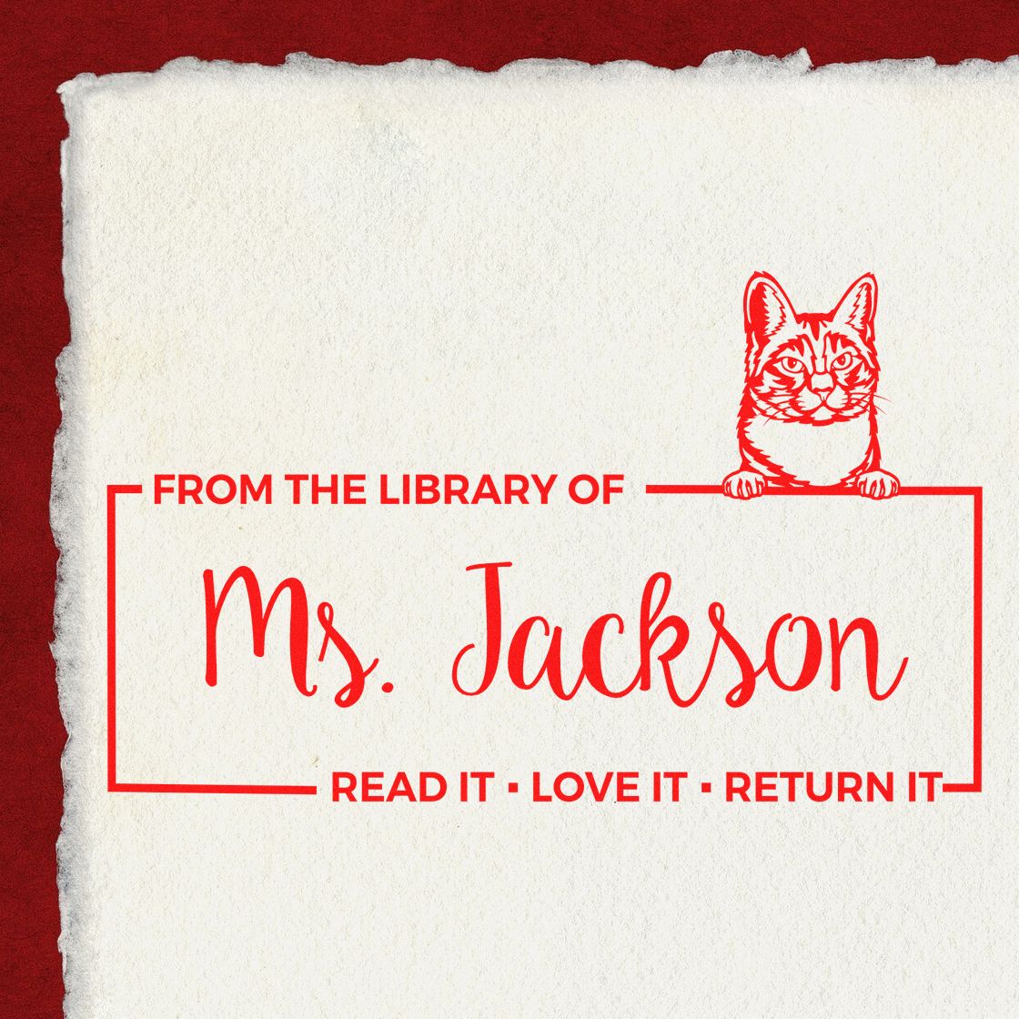 Custom library rubber stamp for Ms. Jackson with cat design and read it, love it, return it book return message.