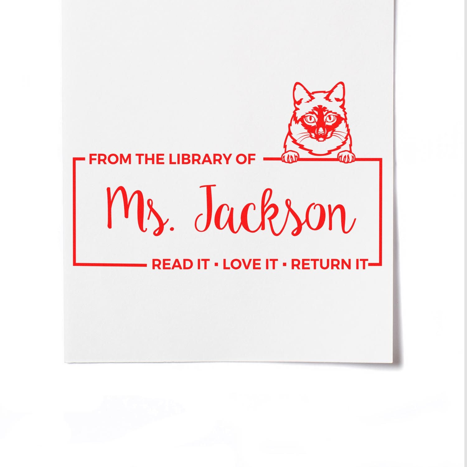 Custom library rubber stamp with fox illustration and From the Library of Ms. Jackson bookplate text.