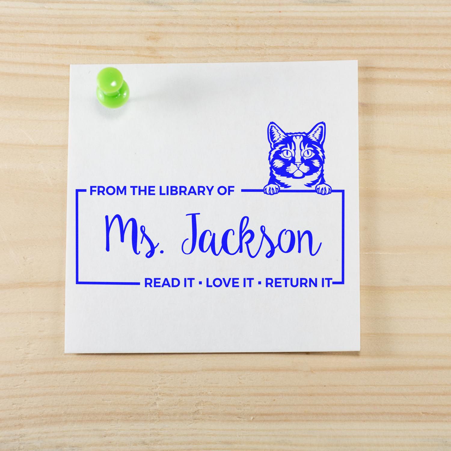 Personalized cat library rubber stamp for Ms. Jackson, with From the Library Of and Read it, love it, return it.