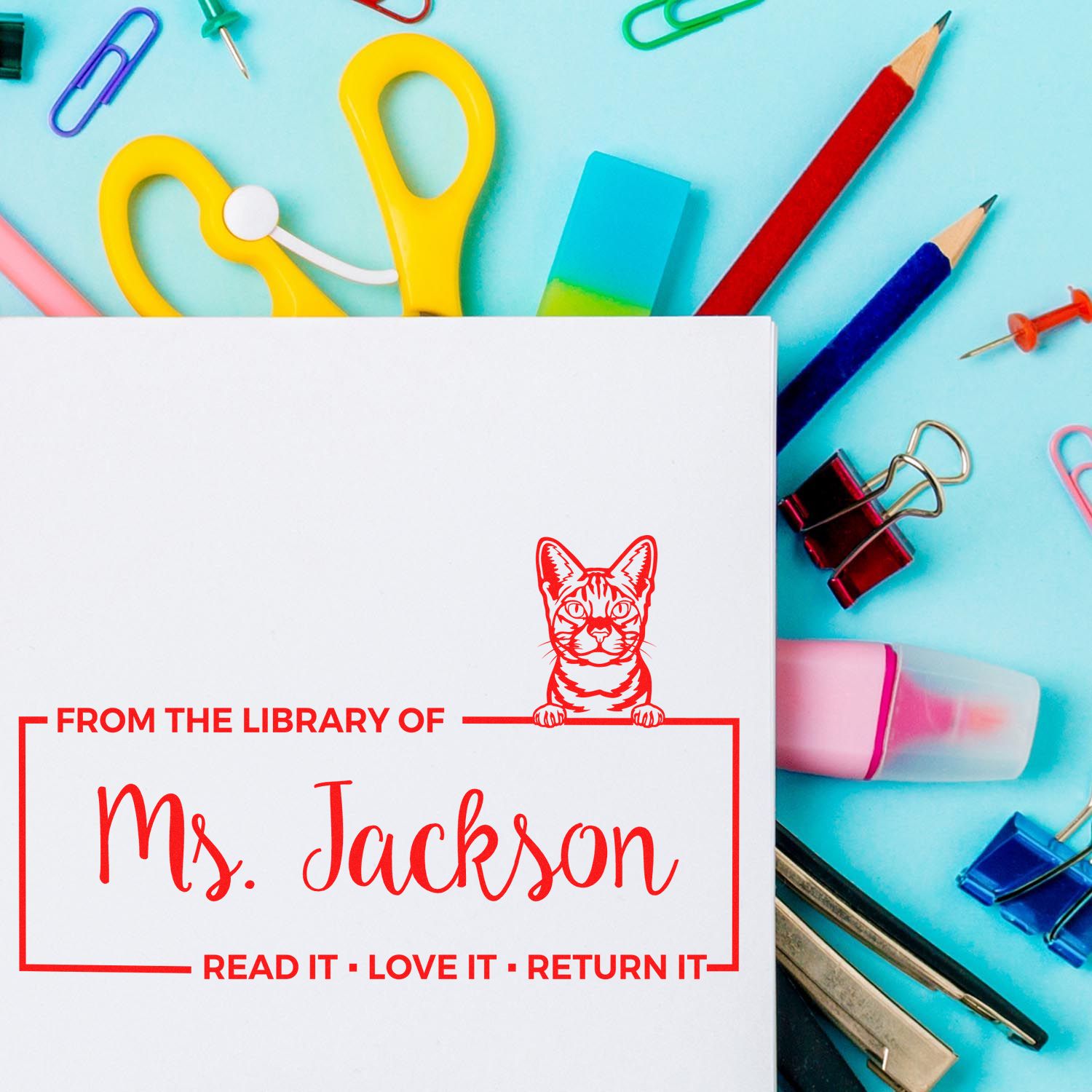 Custom rubber library stamp for Ms. Jackson with cat icon and Read it, love it, return it book label.