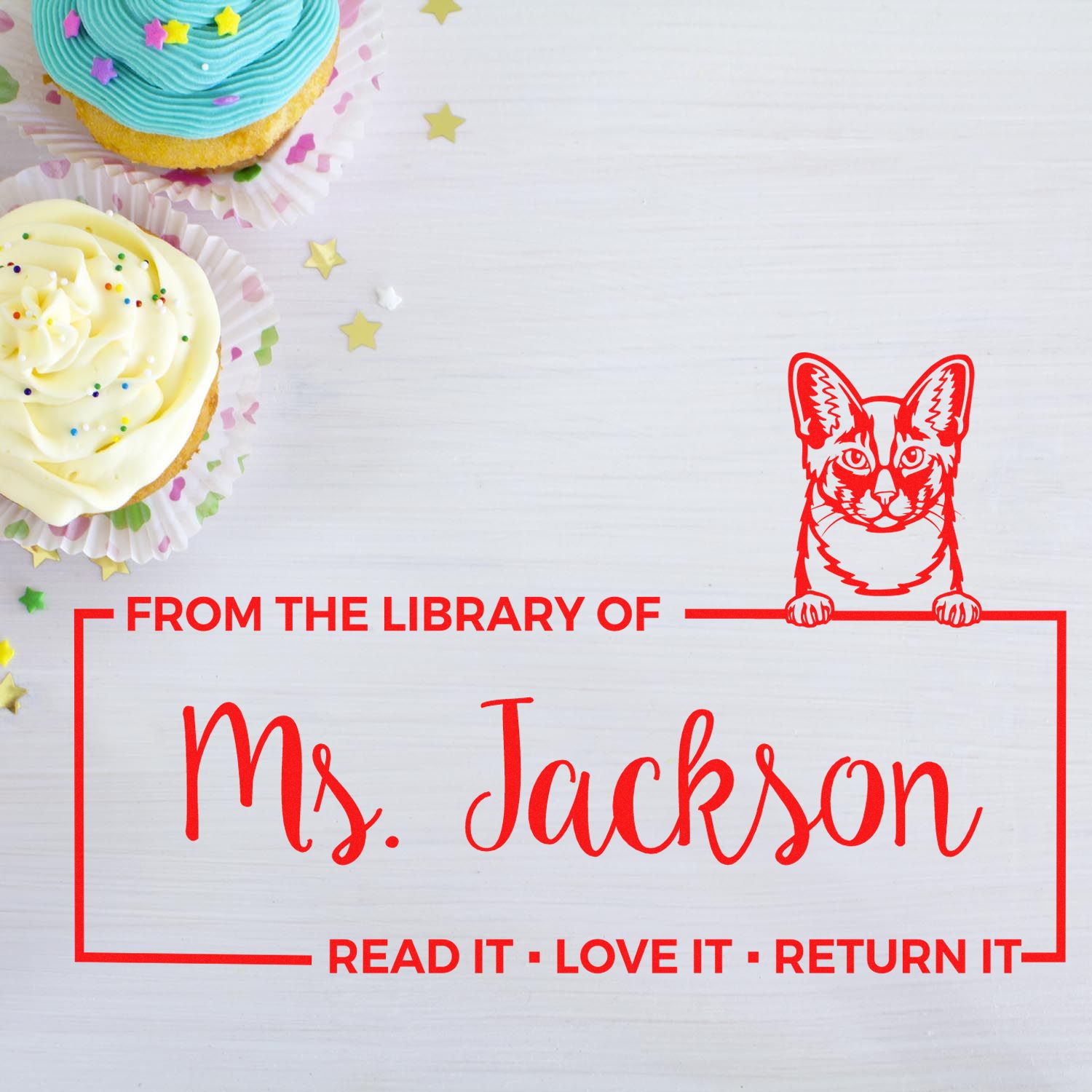 Personalized library rubber stamp for Ms. Jackson with cat icon and Read It, Love It, Return It book return message.