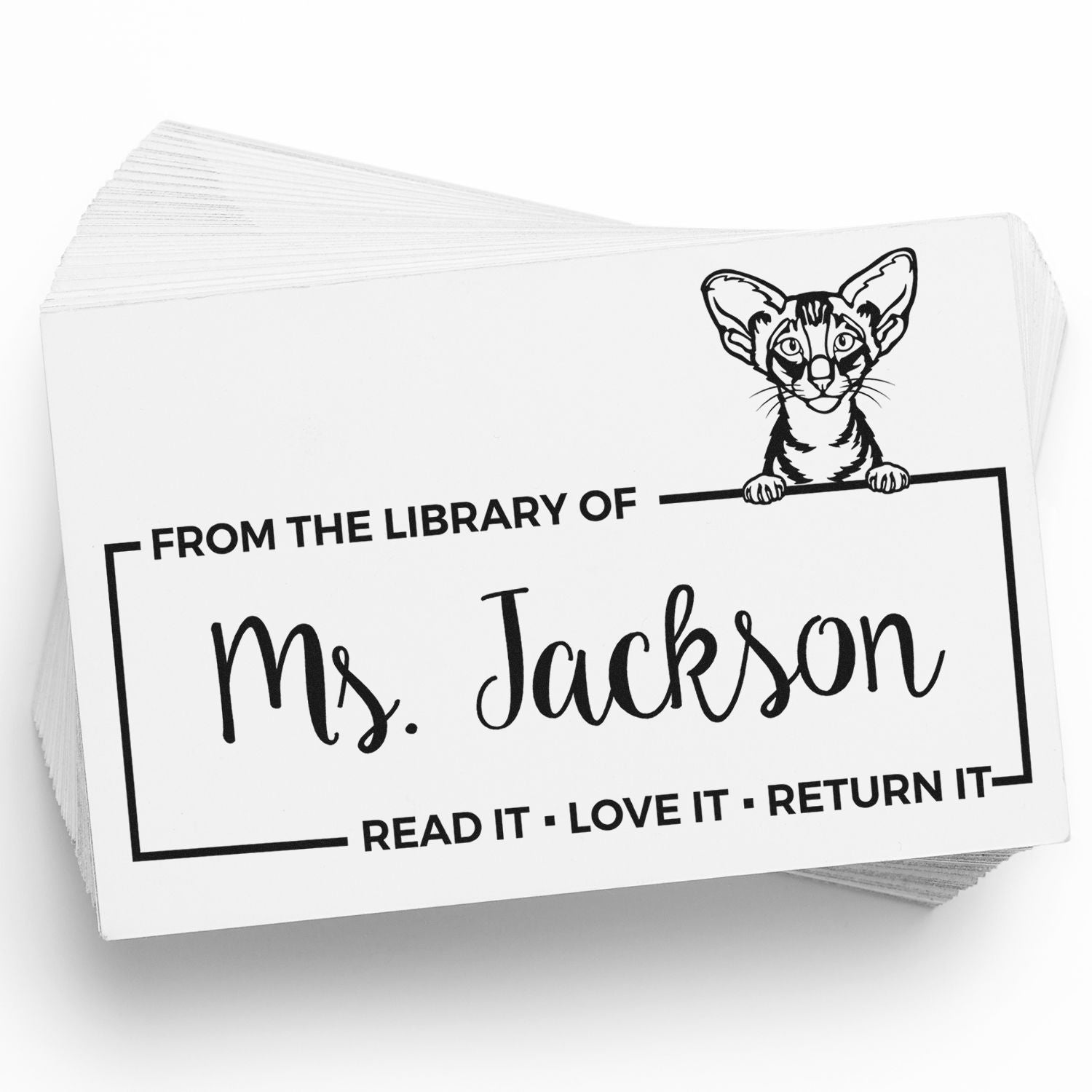 Custom library rubber stamp with cat design and Ms. Jackson name, featuring Read it, love it, return it message.