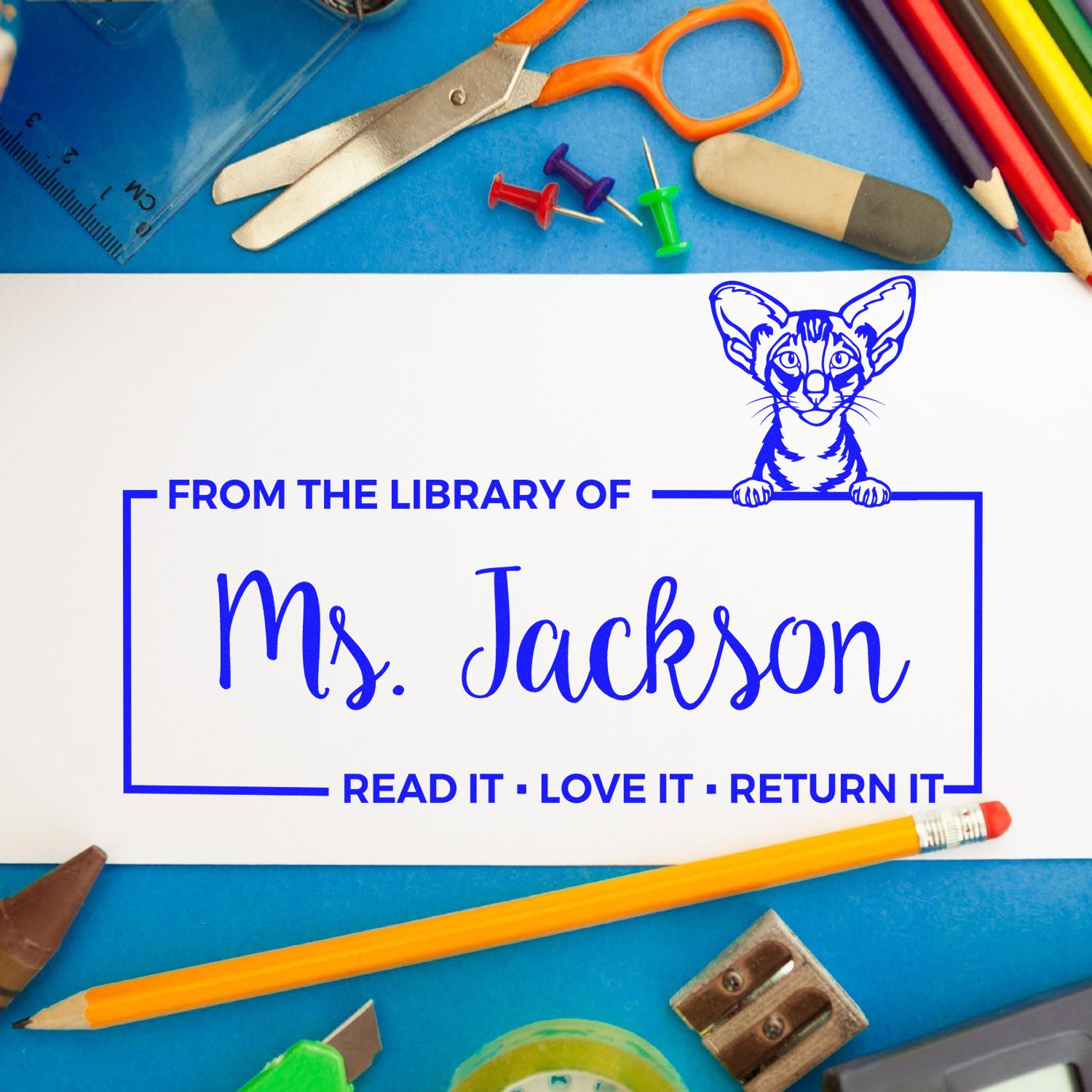 Custom library book stamp for Ms. Jackson with cat design, perfect for personalized teacher and school book labeling.
