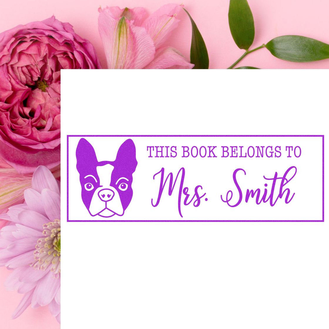 Custom rubber book stamp with dog icon and This Book Belongs to Mrs. Smith text, perfect for personalized library marking.