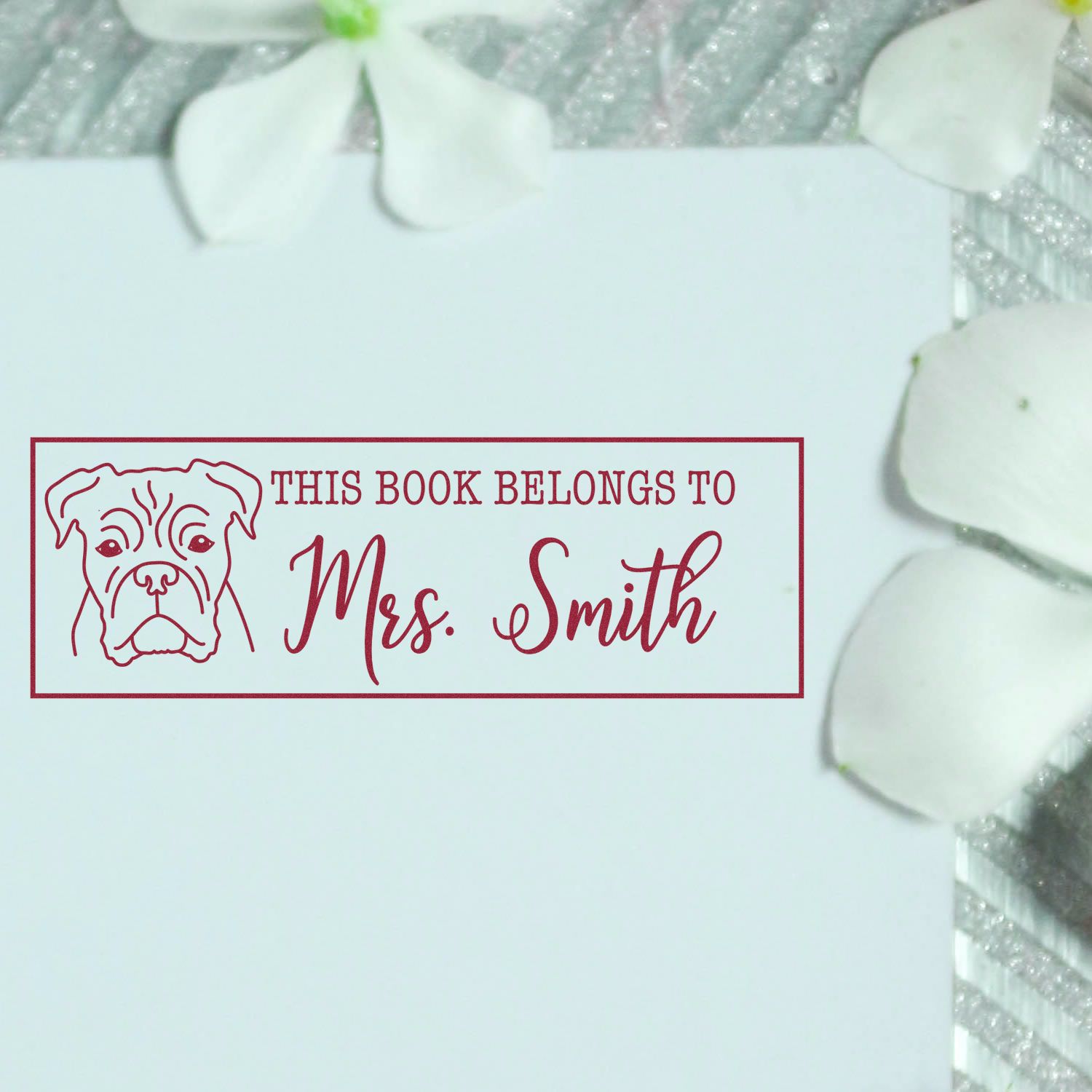 Personalized dog bookplate rubber stamp reading This Book Belongs to Mrs. Smith for custom library books.