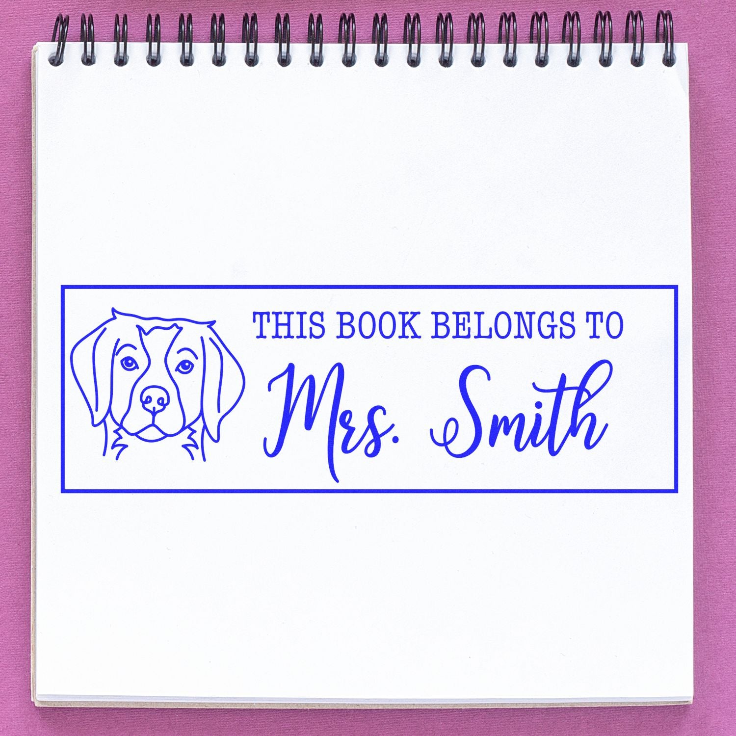 Custom dog bookplate rubber stamp with This Book Belongs to Mrs. Smith for personalized library books.