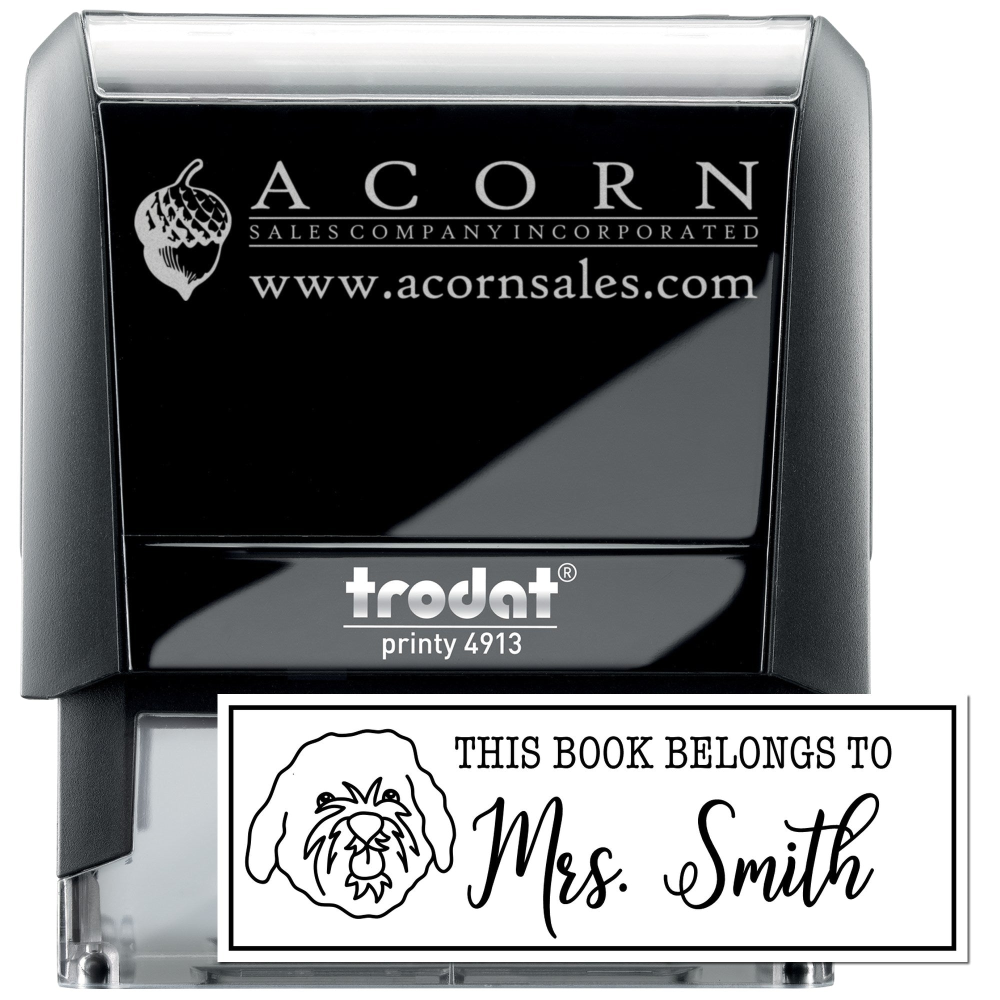 Custom self-inking rubber stamp set with Acorn Sales logo and personalized This Book Belongs To name stamp.