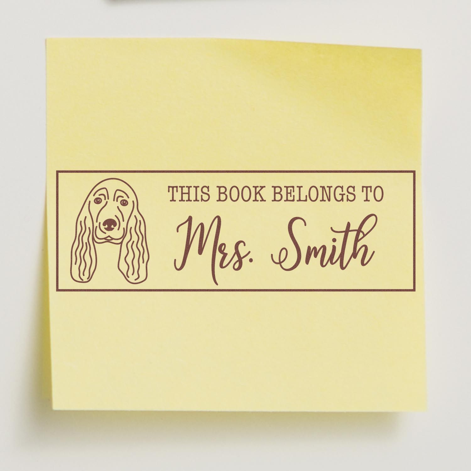 Personalized rubber stamp for books with dog portrait and This Book Belongs To Mrs. Smith custom library label.