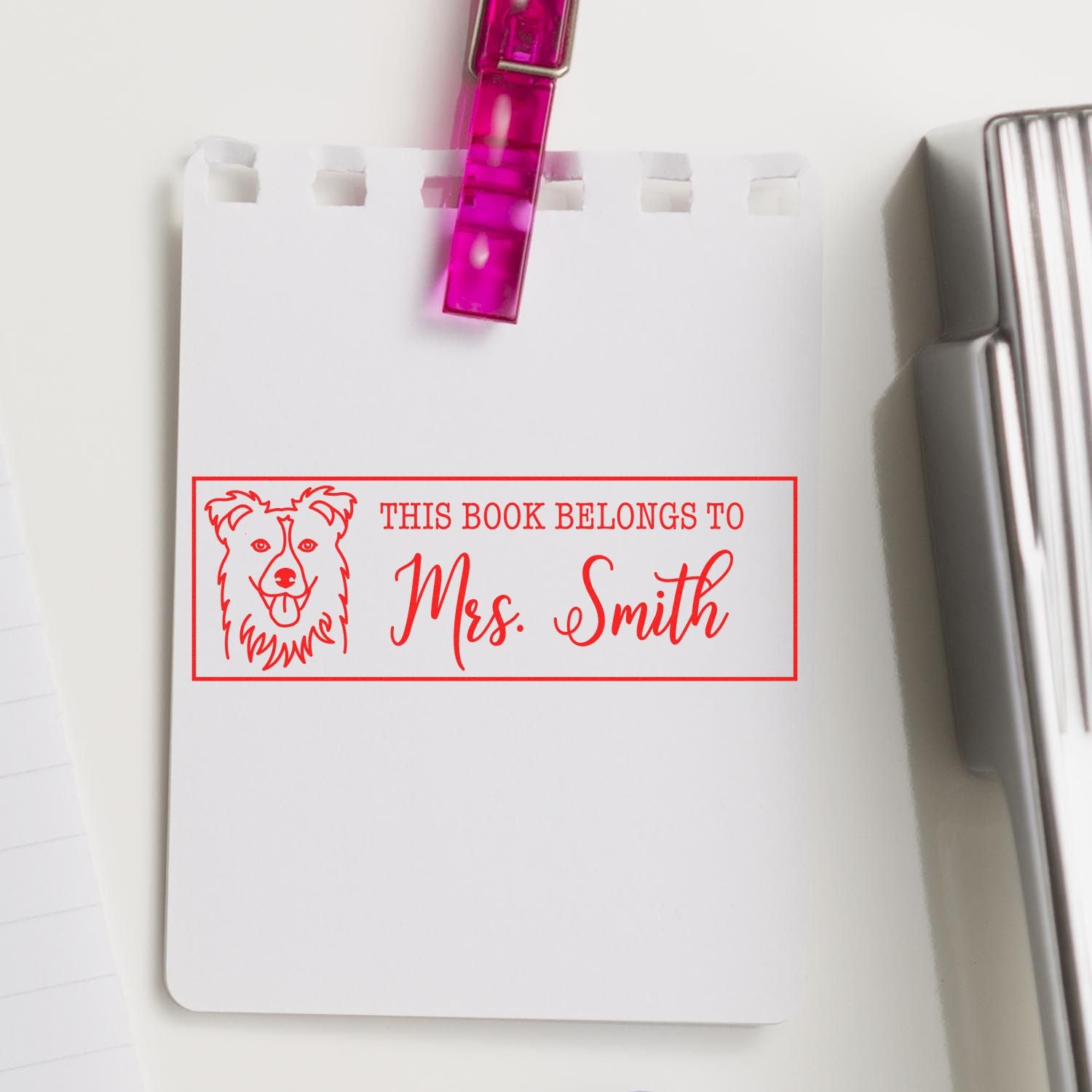 Custom dog book rubber stamp imprint reading This Book Belongs to Mrs. Smith for personalized library books.
