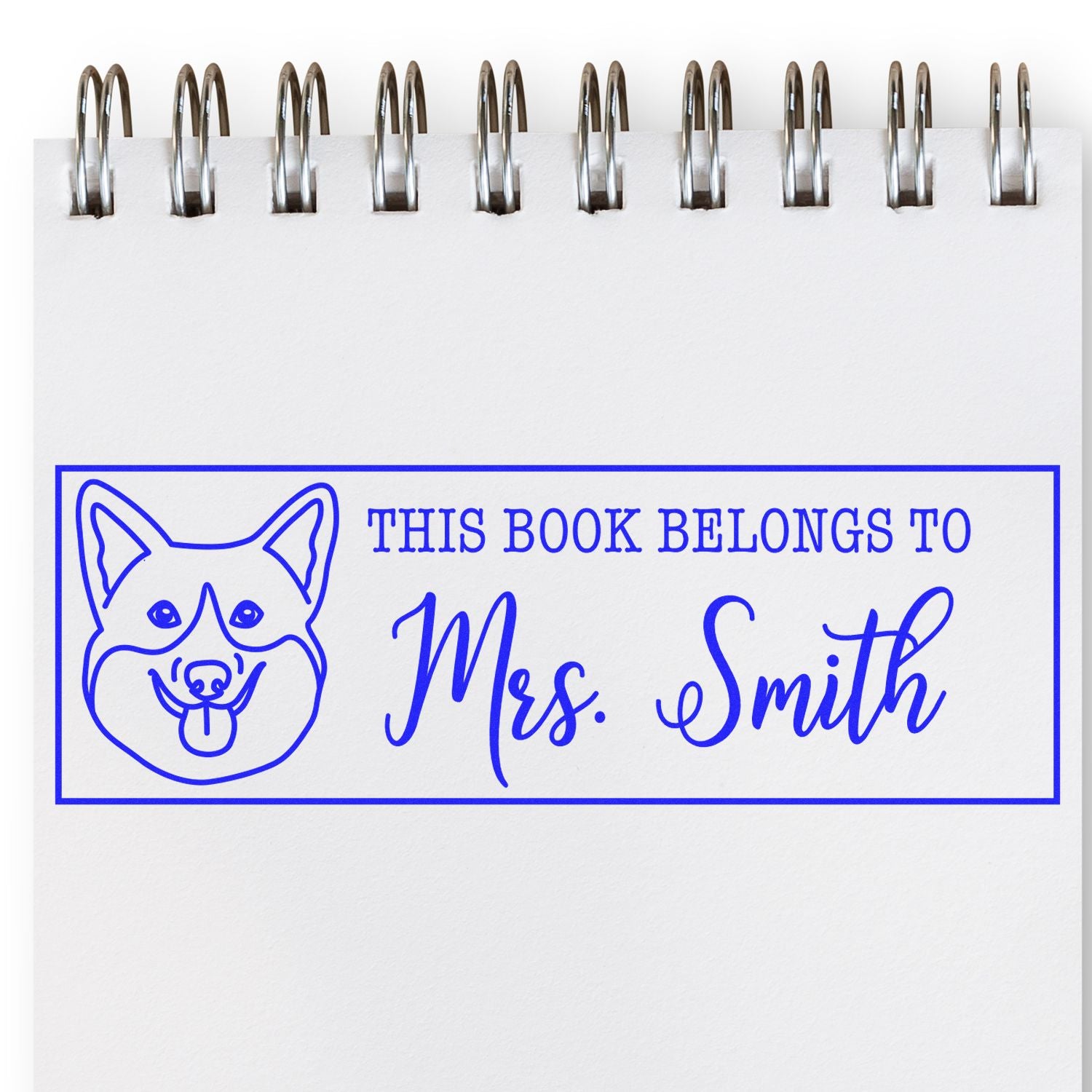 Personalized rubber stamp design with dog illustration and This Book Belongs to Mrs. Smith for custom book ownership labeling