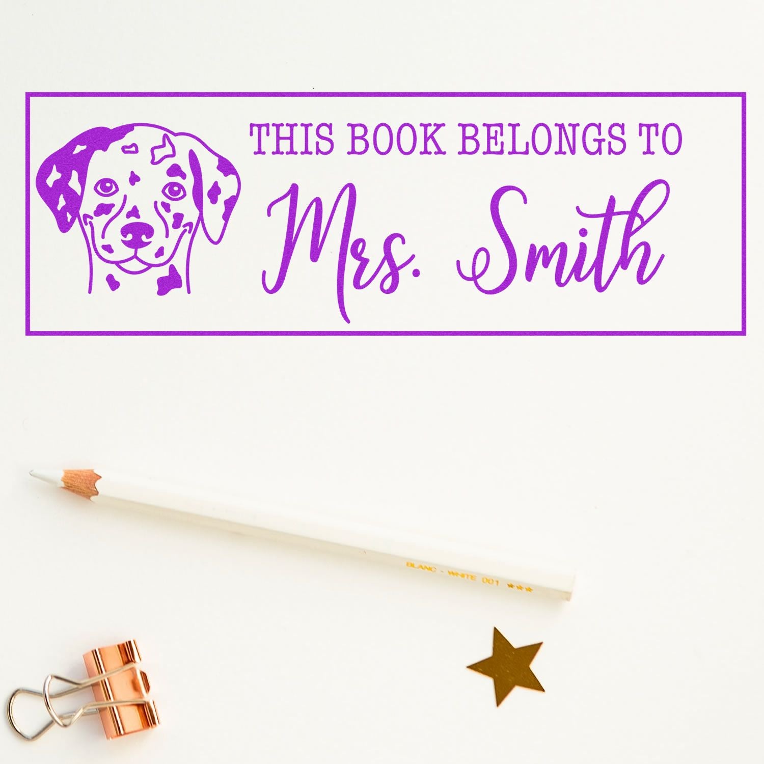 Personalized rubber book stamp with Dalmatian dog, reading This Book Belongs to Mrs. Smith for library book labels.