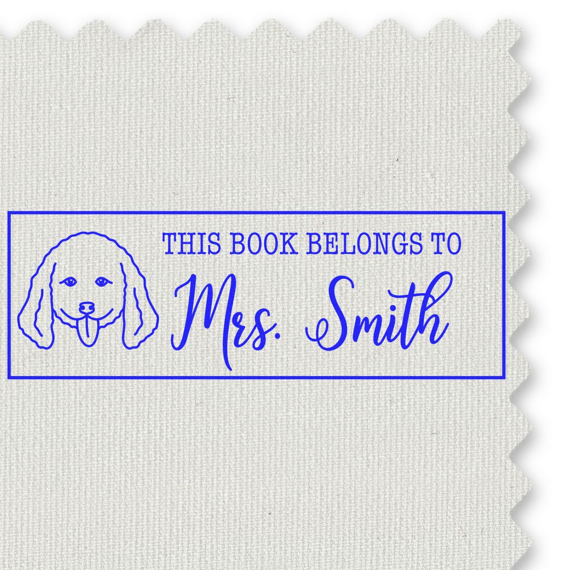 Custom blue rubber stamp reading This Book Belongs to Mrs. Smith with dog illustration for personalized book labeling.