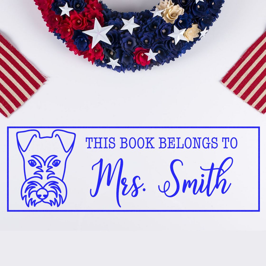 Custom rubber stamp for books with dog illustration and This Book Belongs to Mrs. Smith personalized library label.